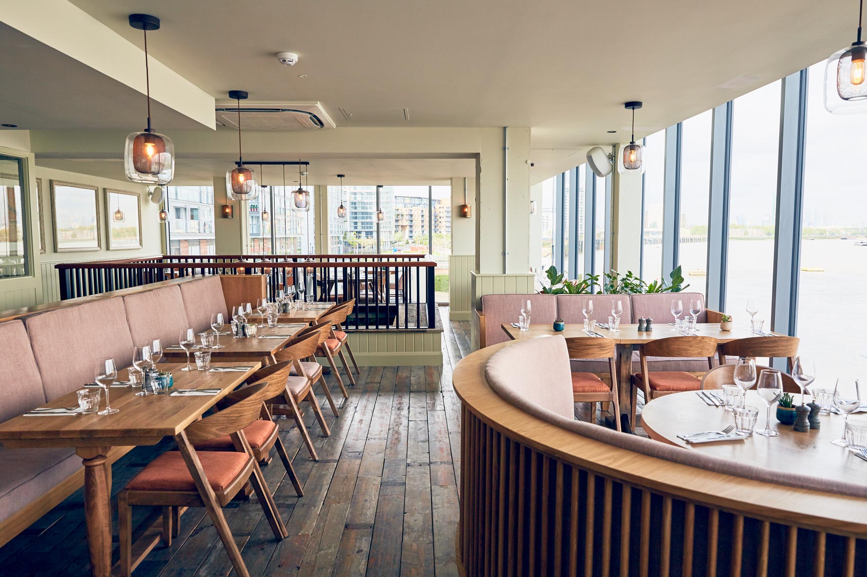 Stylish restaurant space with natural light, ideal for meetings and events at The Oystercatcher.