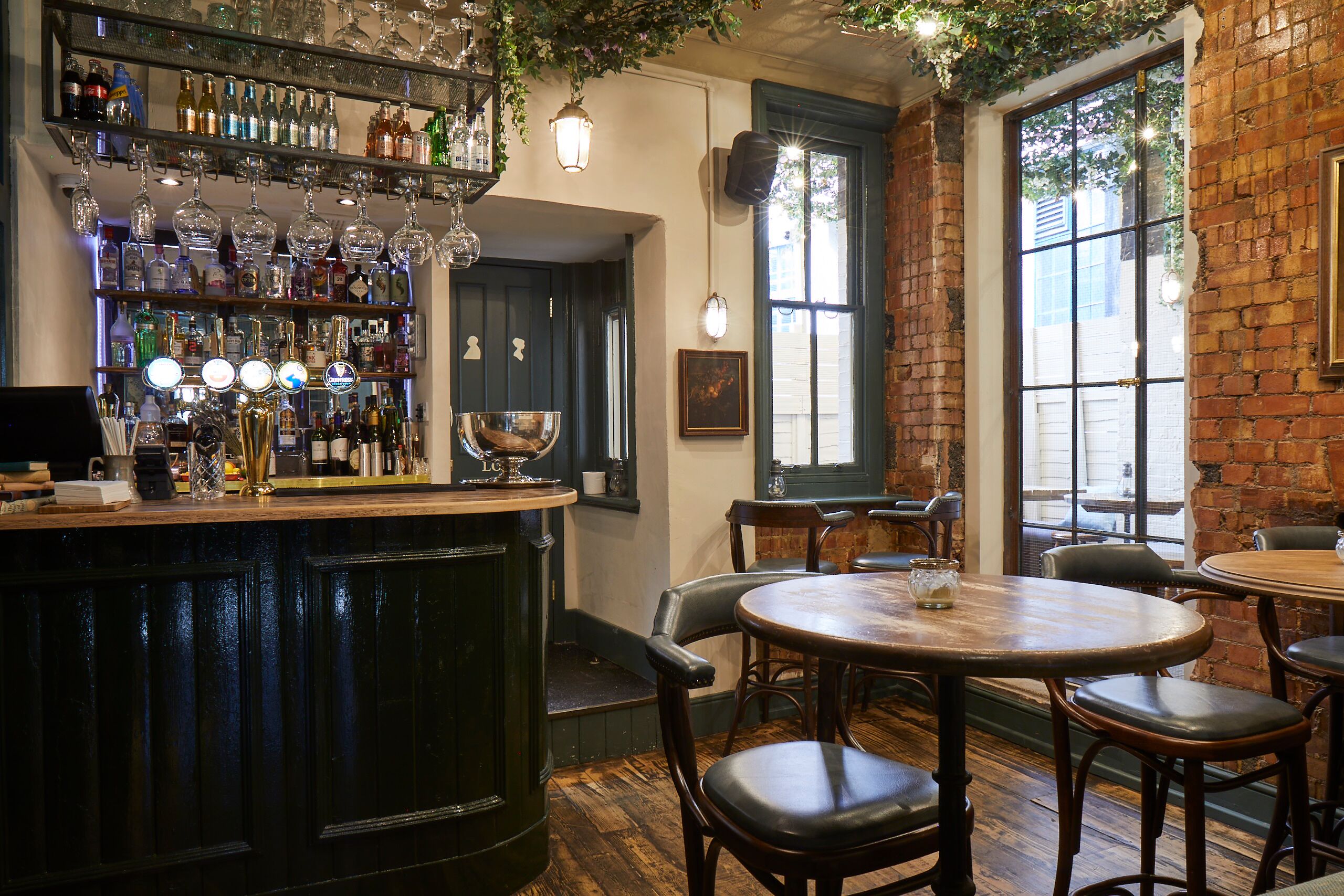 Cozy Gin Terrace at Bow Street Tavern, ideal for intimate gatherings and networking events.