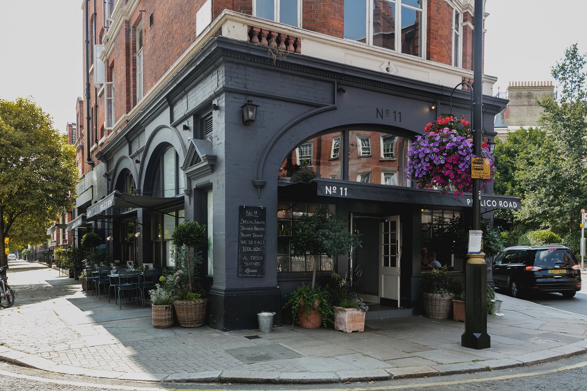 Private dining room with outdoor seating, ideal for intimate meetings and events.