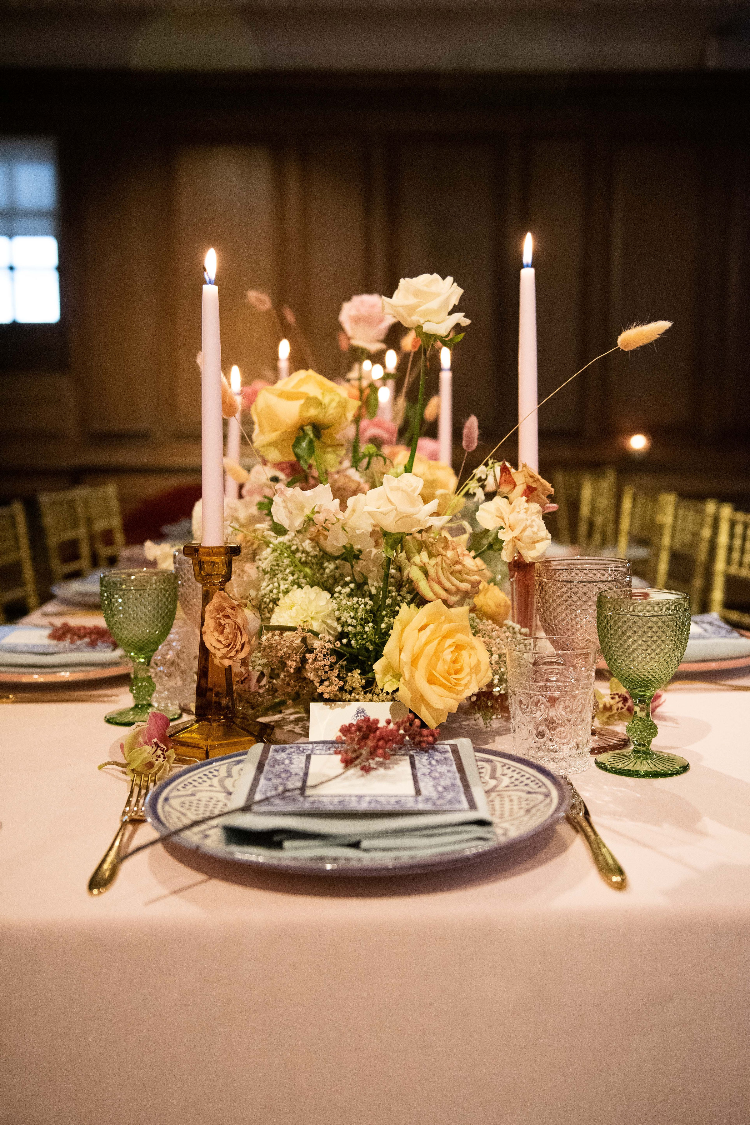 Elegant dining table with floral centerpiece in Maison Assouline for upscale events.