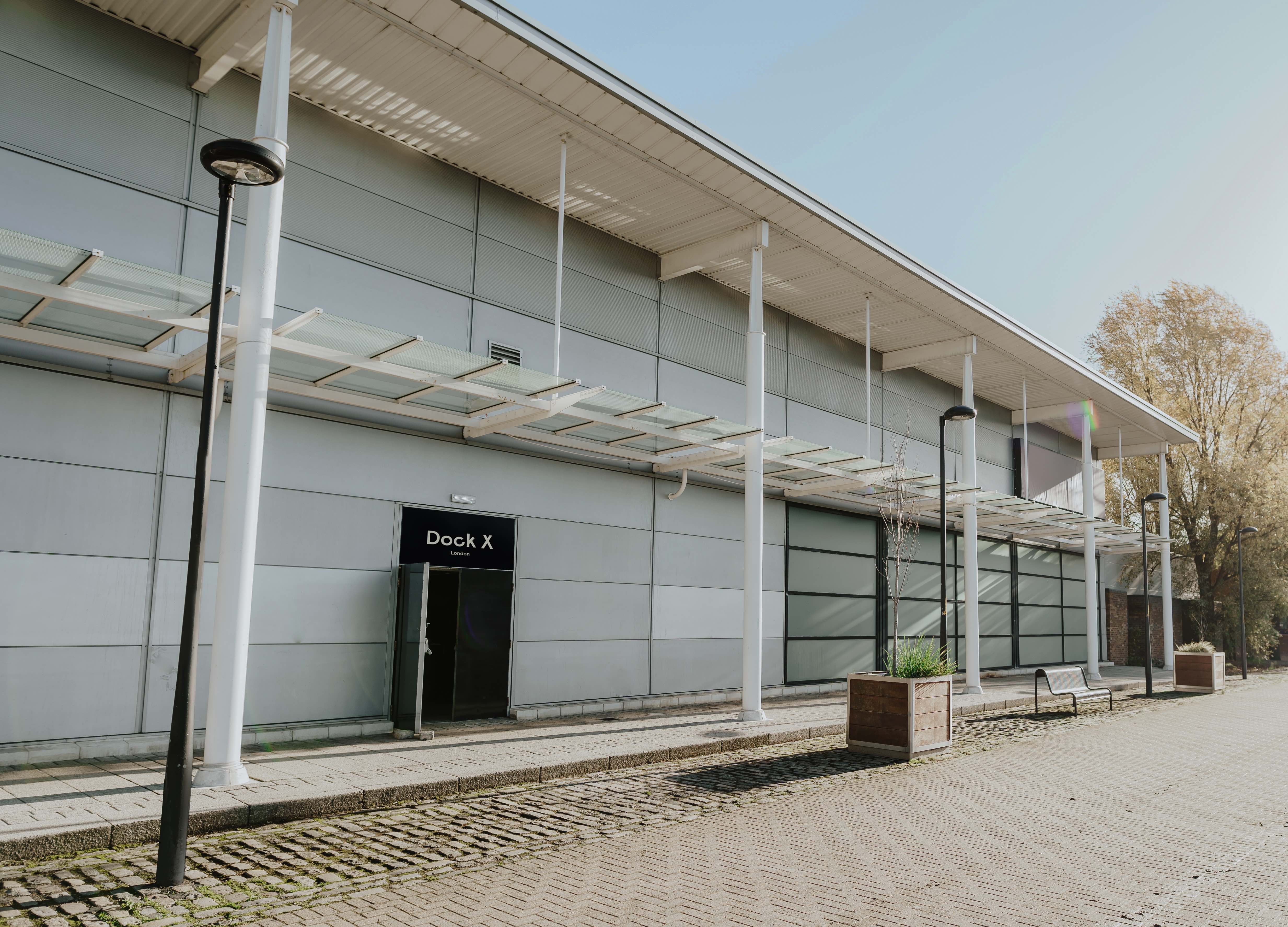 Modern Dock X London venue with glass doors, perfect for corporate events and exhibitions.