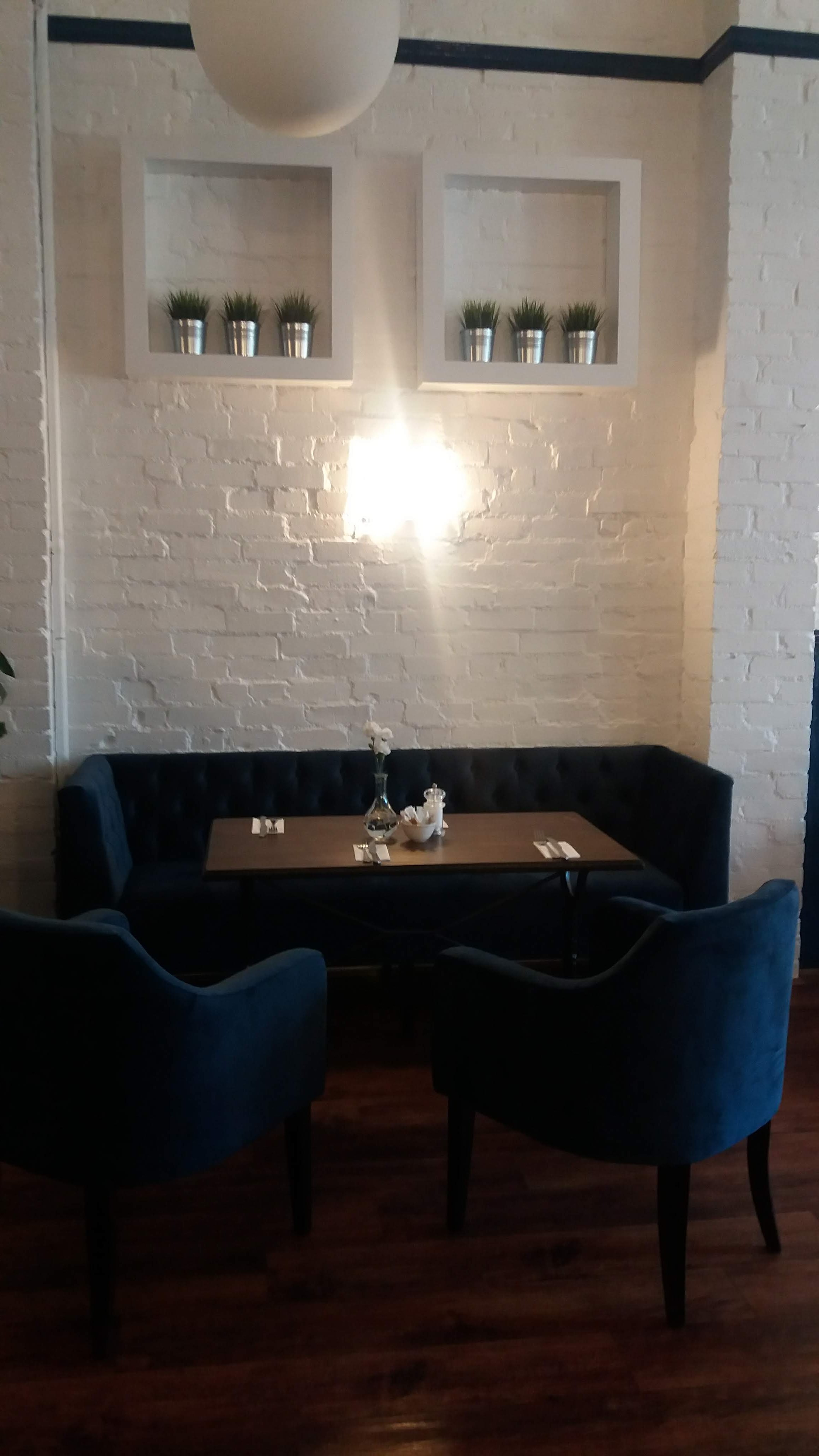 Cozy dining setup in Stella's Room, ideal for private events and team-building activities.