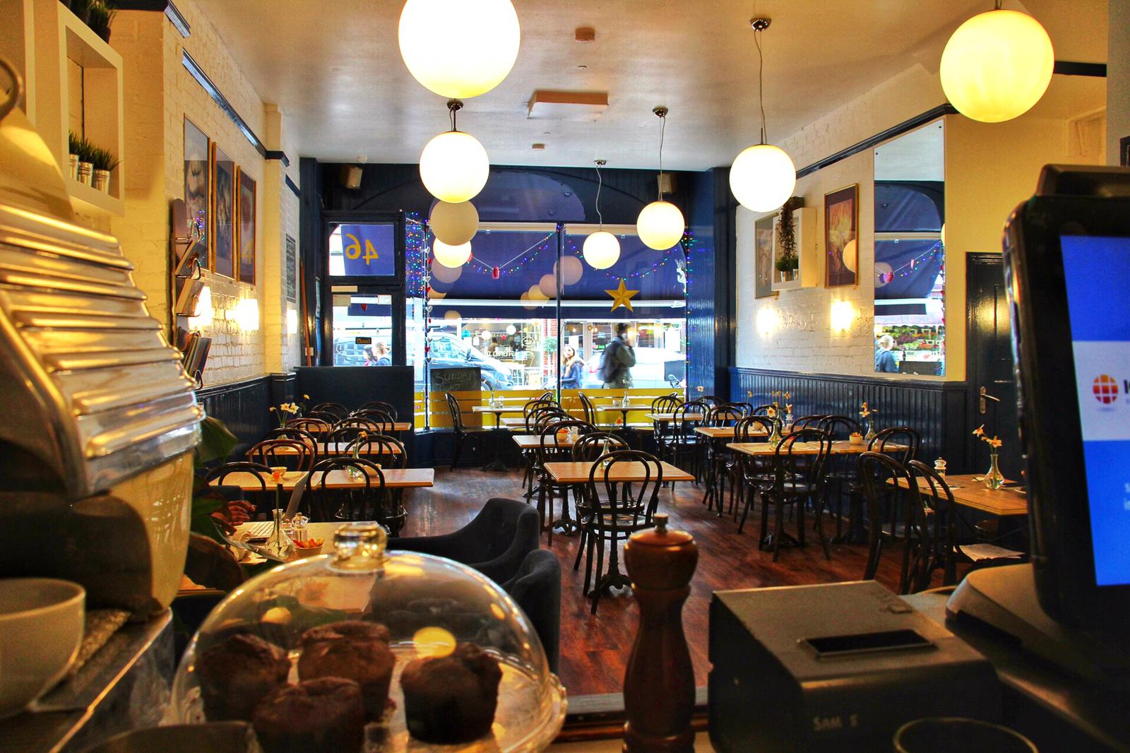 Cozy café in Stella's Room, perfect for intimate meetings and small events.