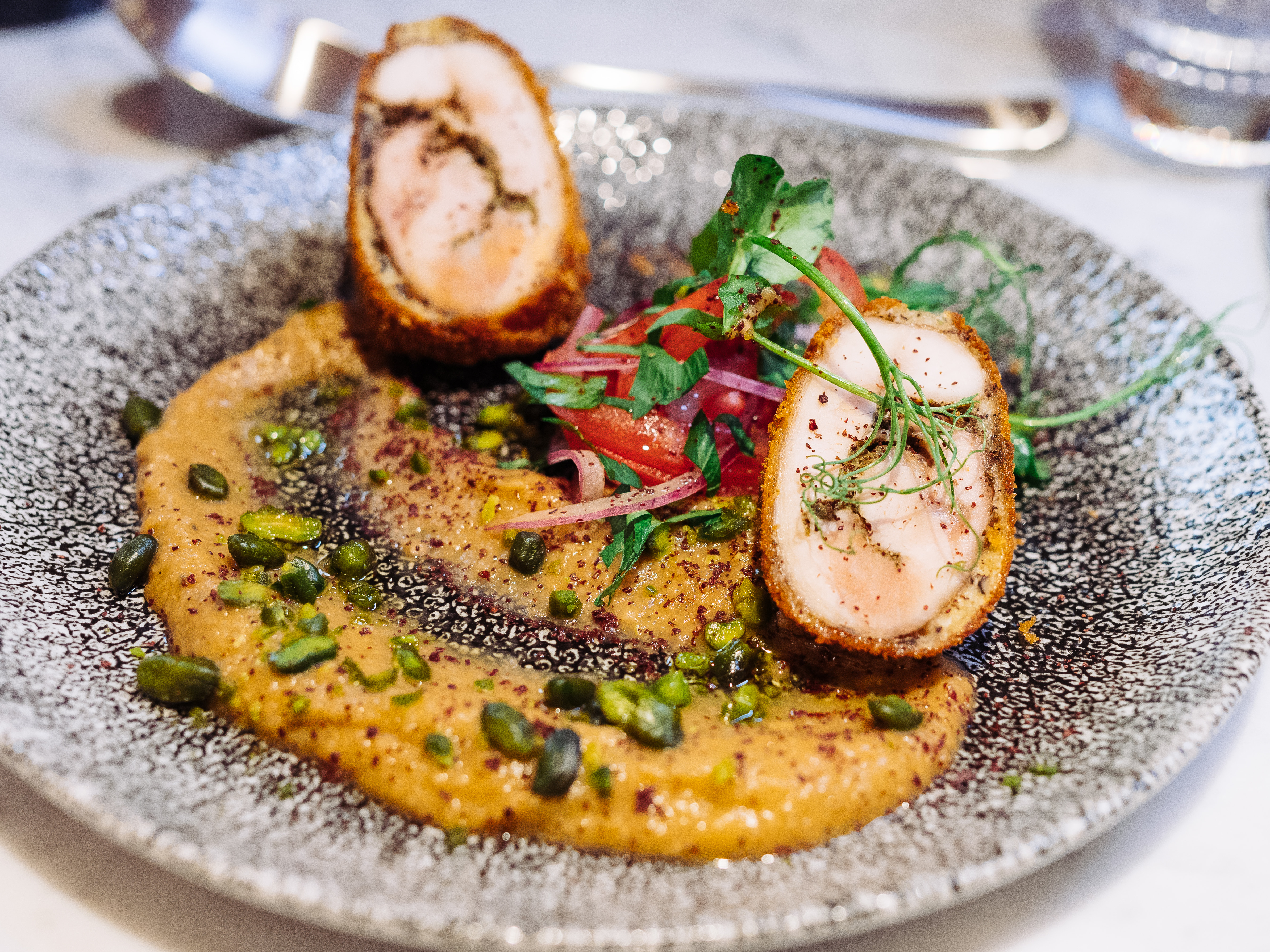 Vibrantly plated gourmet dish at The Boulevard restaurant for event catering.