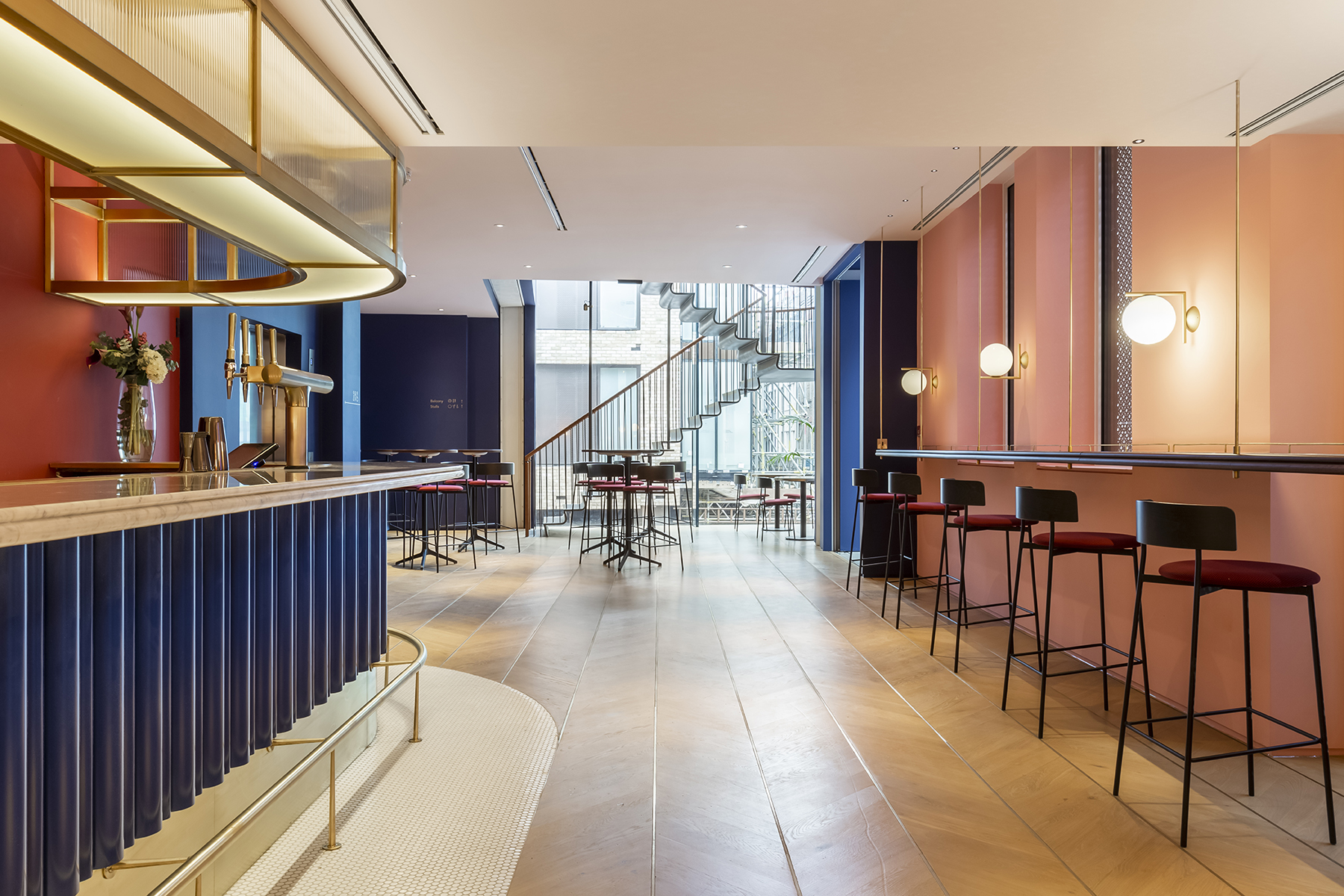 Elegant restaurant and bar venue with sleek design, perfect for social events and meetings.