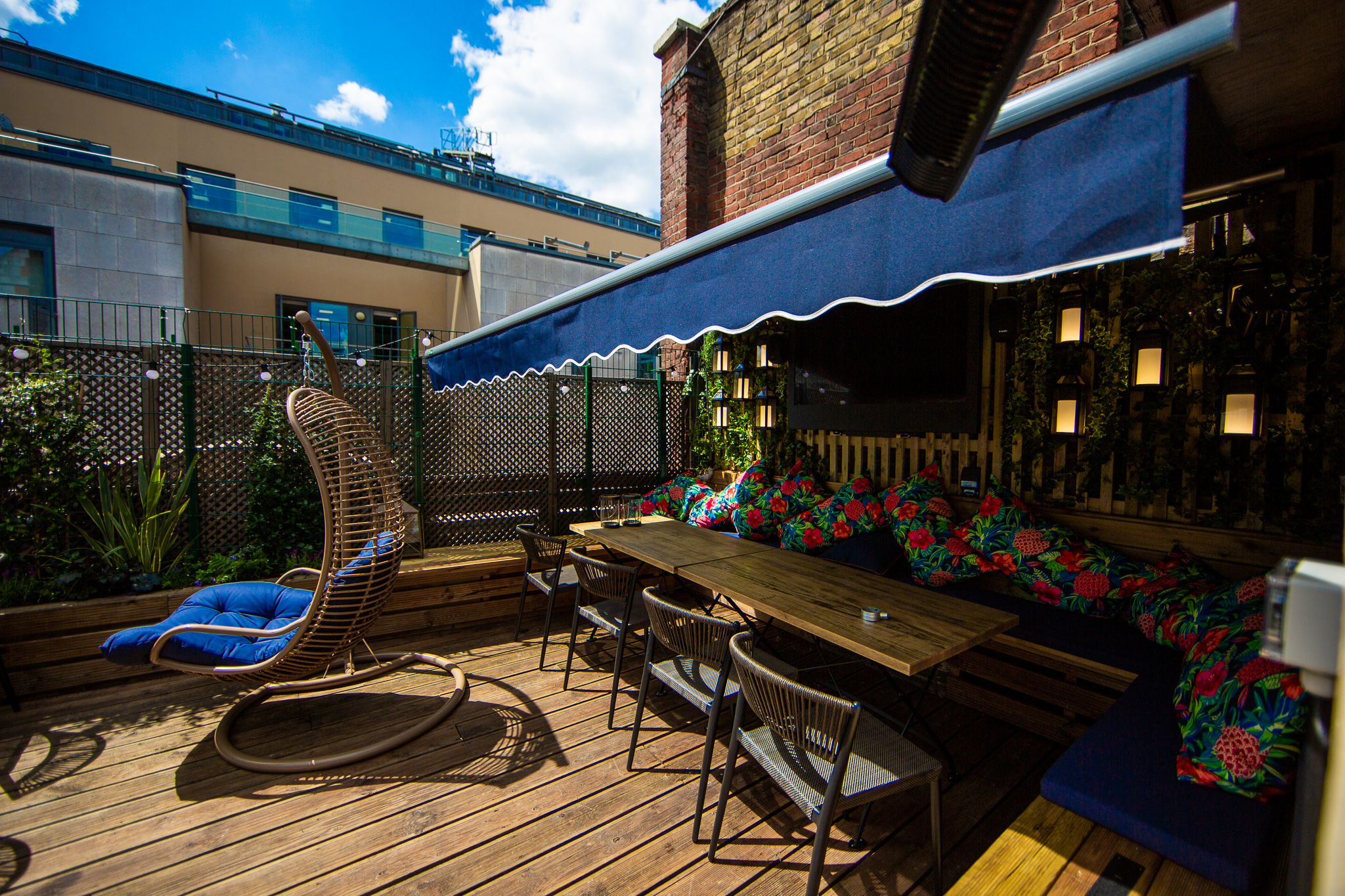 Vibrant outdoor terrace at Bow Street Tavern, ideal for networking and casual meetings.