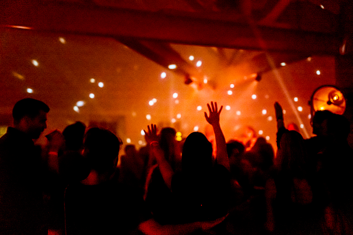 Festive townhouse gala with high-energy lighting, perfect for corporate closing events and parties.