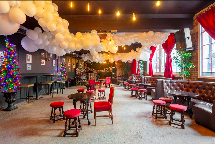 Vibrant U7 Lounge event space with festive decor for social gatherings and receptions.