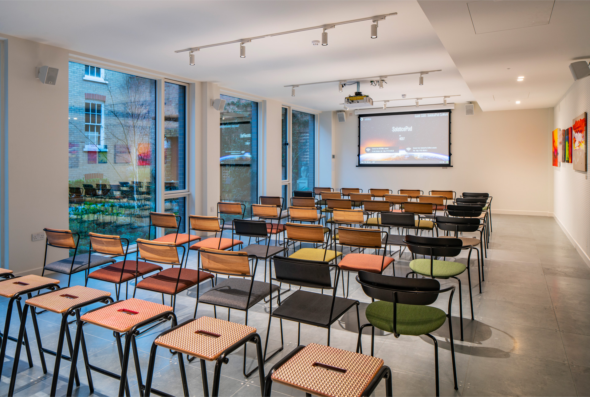 Versatile meeting space in People's Mission Hall, ideal for workshops and presentations.