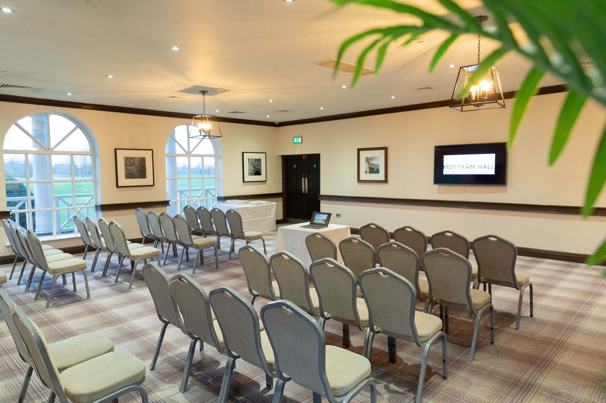 Thomas Suite at Mottram Hall: elegant meeting room for corporate presentations.
