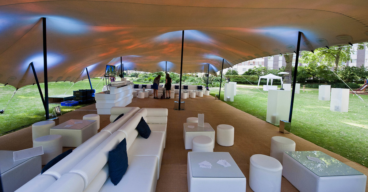 Portman Square Garden tented event space with modern lounge seating for gatherings.
