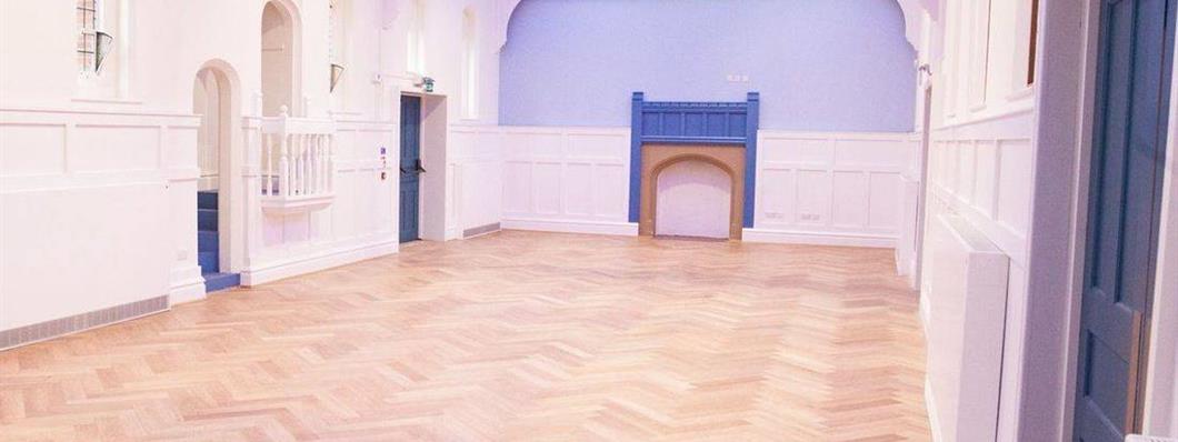 Byculla Suite in Ashburton Hall, Croydon: elegant event space with wooden flooring.