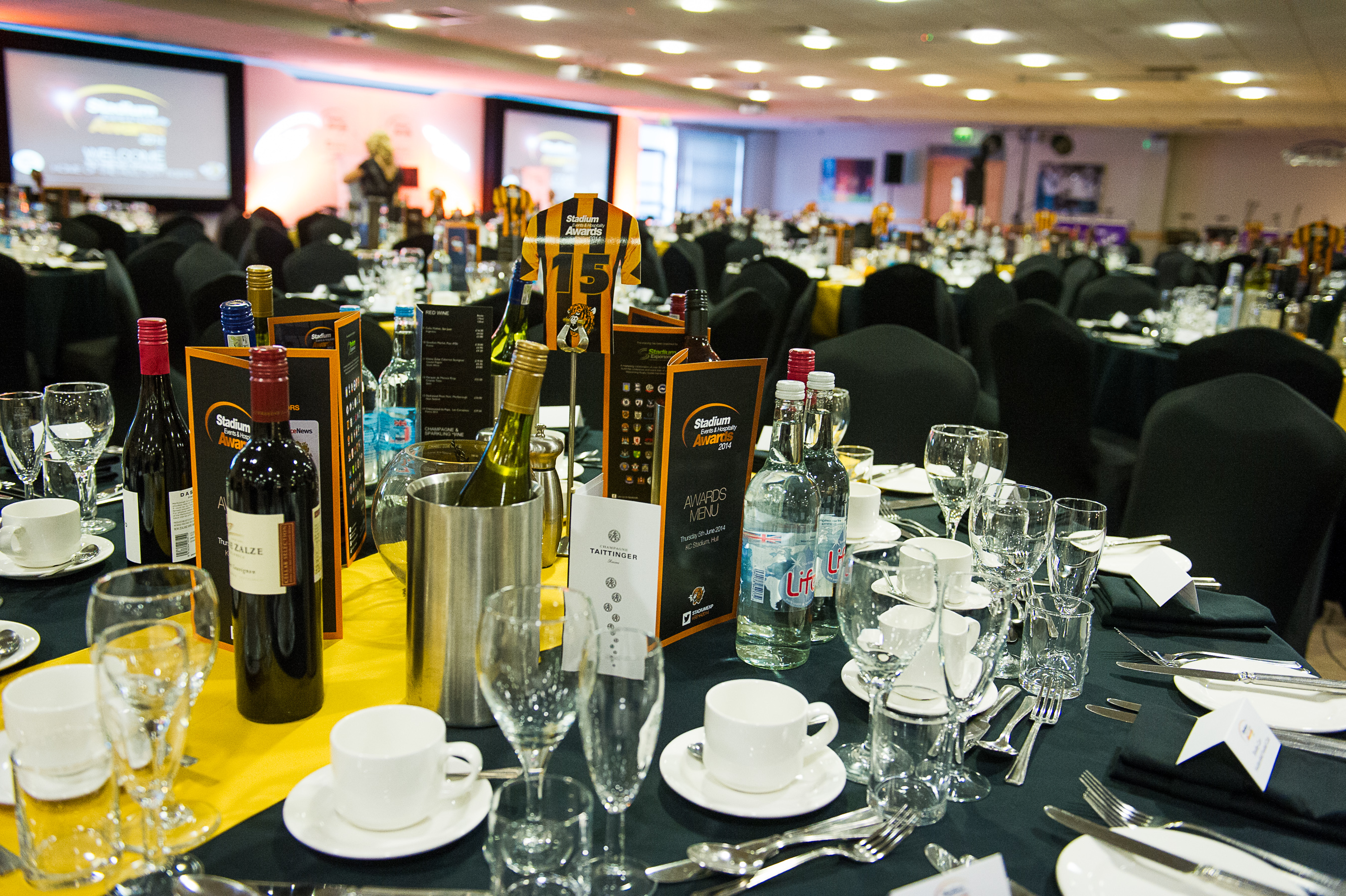 Elegant banquet setup in Kingston Suite, MKM Stadium for formal events and presentations.
