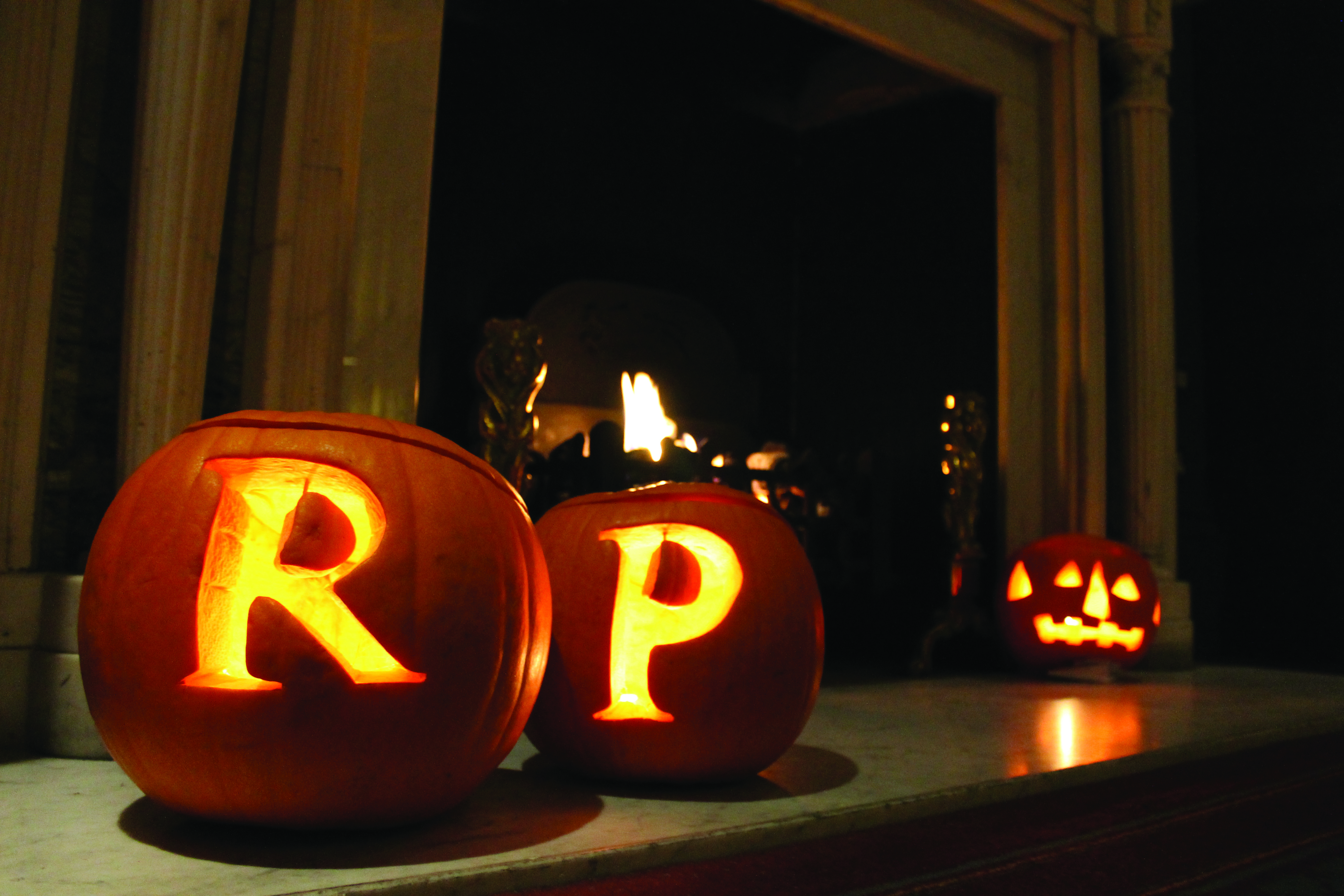 Cozy Rudding Park Library with carved pumpkins for Halloween event ambiance.