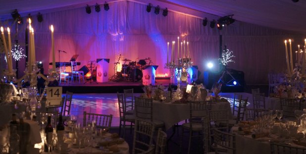 Elegant event space at Rudding Park Library with fine dining setup for gala celebration.