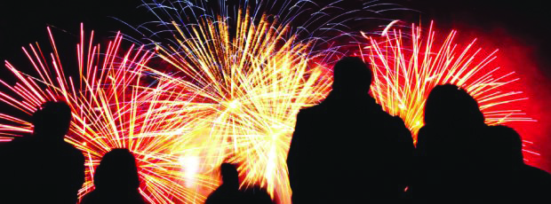 Vibrant fireworks illuminate Rudding Park Library for a memorable outdoor event.