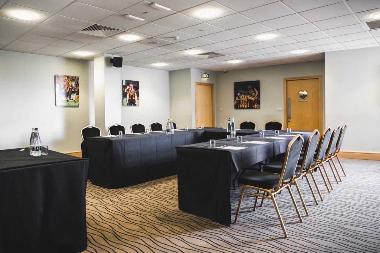 The Needler Suite in MKM Stadium, U-shaped table setup for professional meetings.