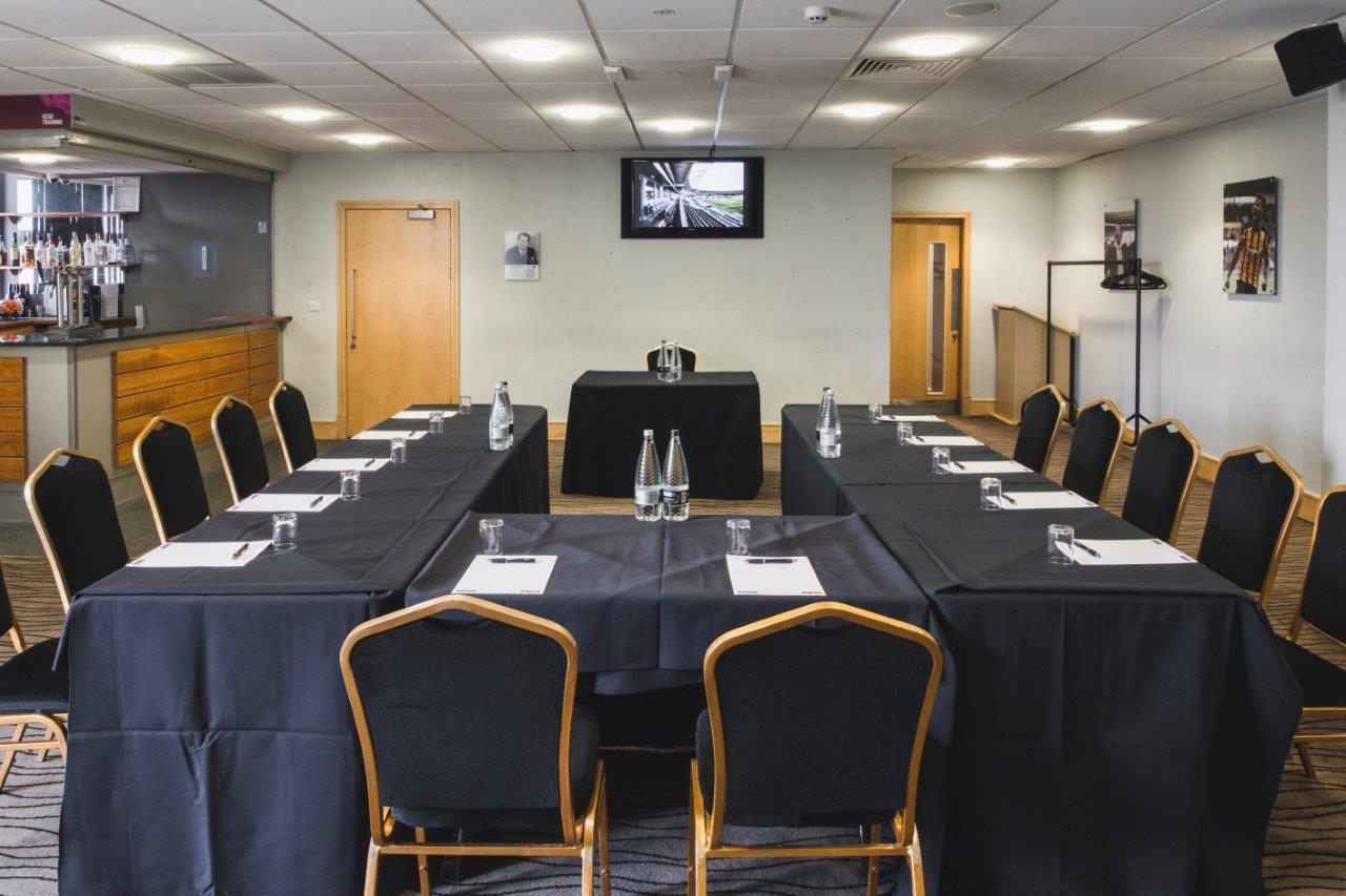 The Needler Suite in MKM Stadium, U-shaped meeting room for professional events.