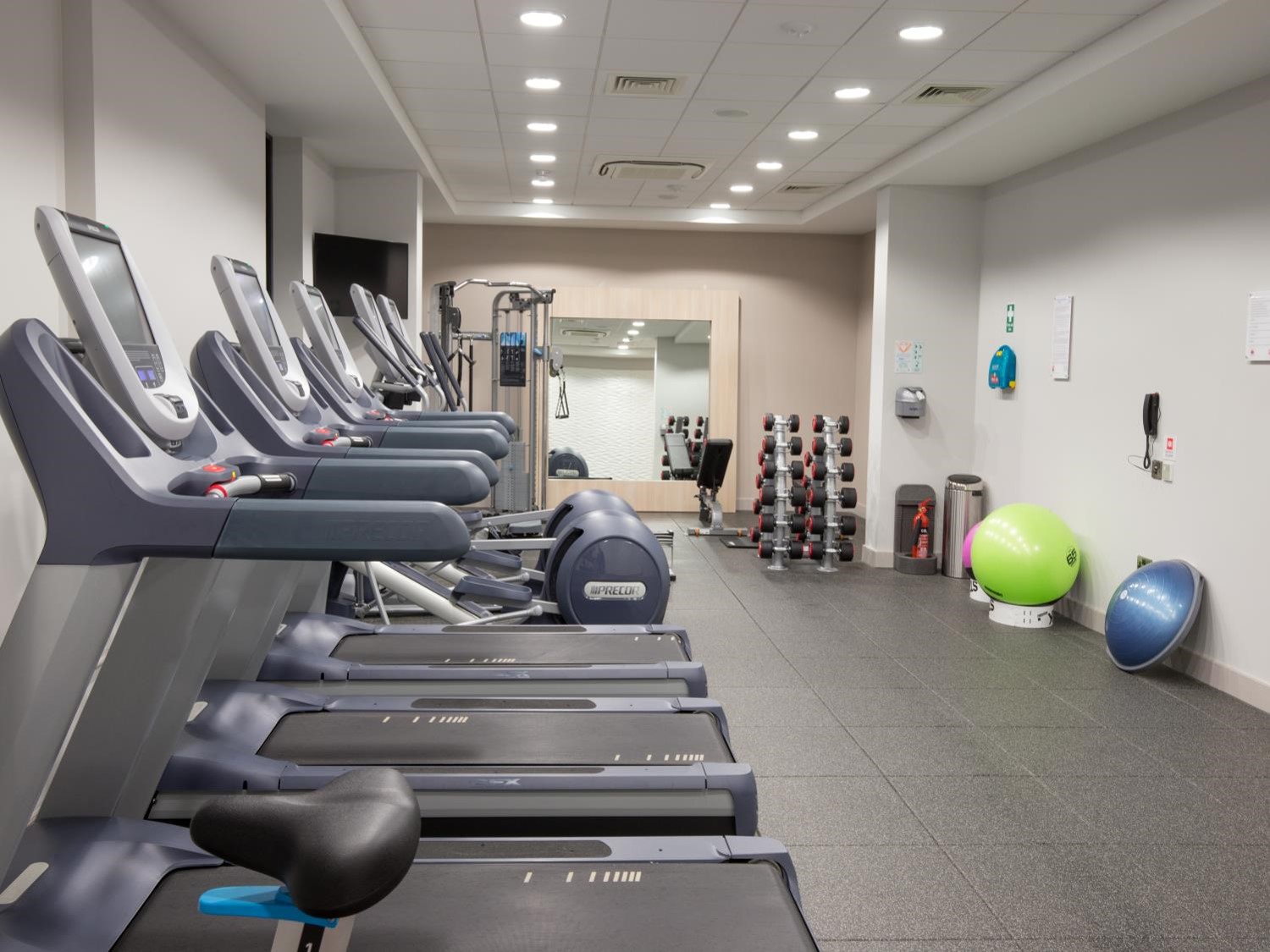 Kings Cross Suite fitness area with treadmills for wellness events at DoubleTree by Hilton.