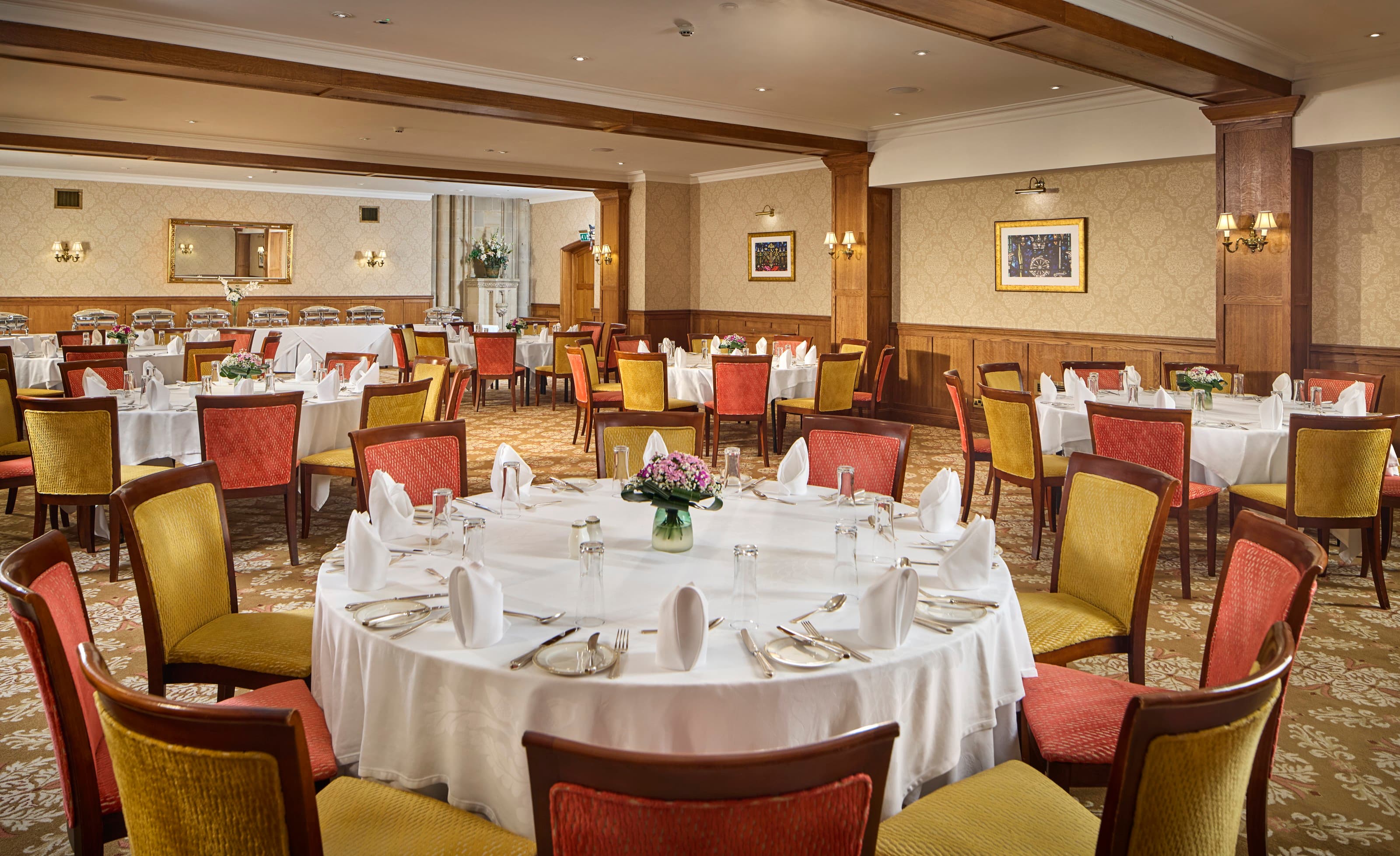 John Haywood at Ashdown Park Hotel, banquet-style setup for corporate events and formal dinners.