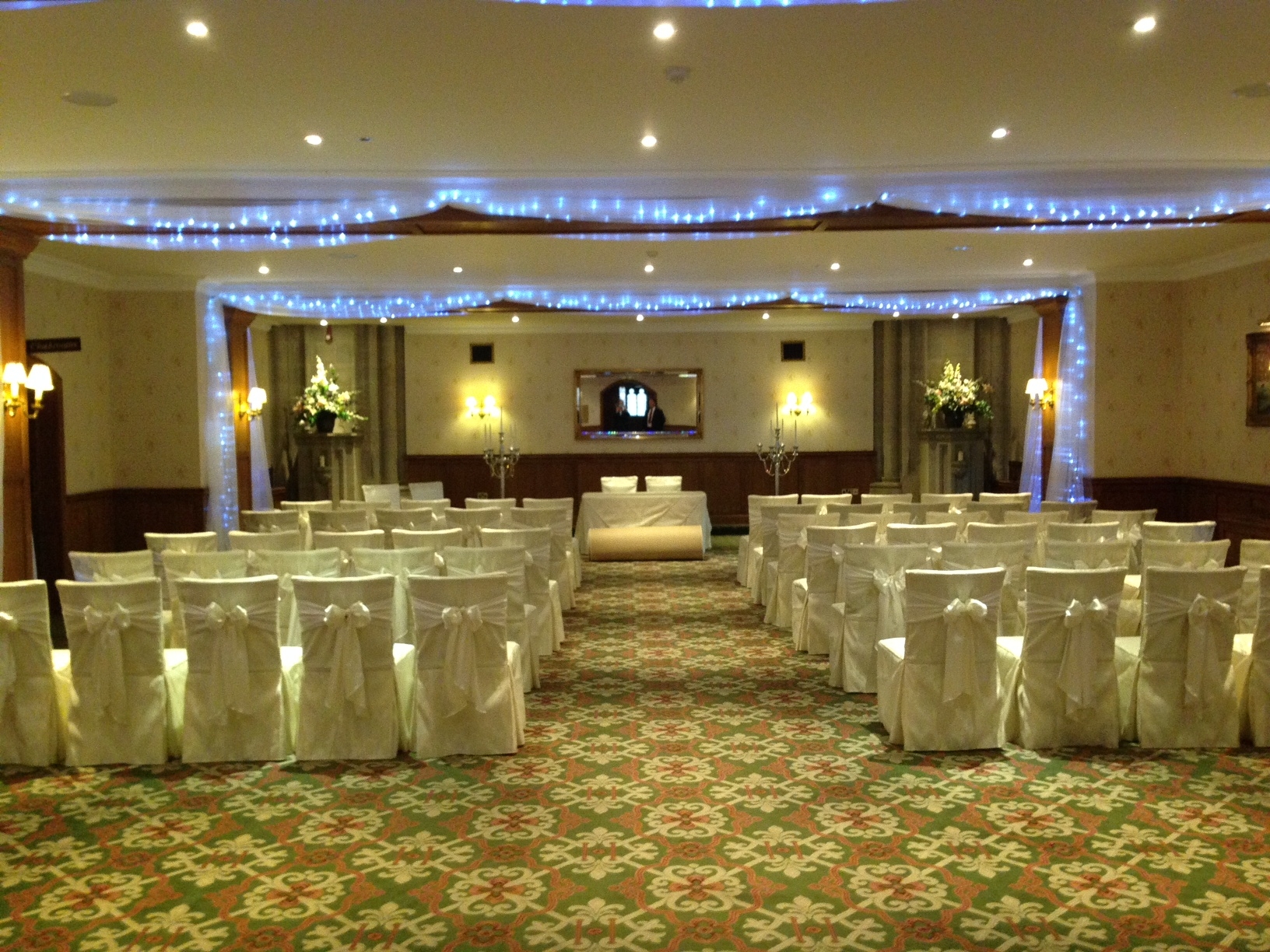 John Haywood in elegant wedding setup at Ashdown Park Hotel & Country Club.