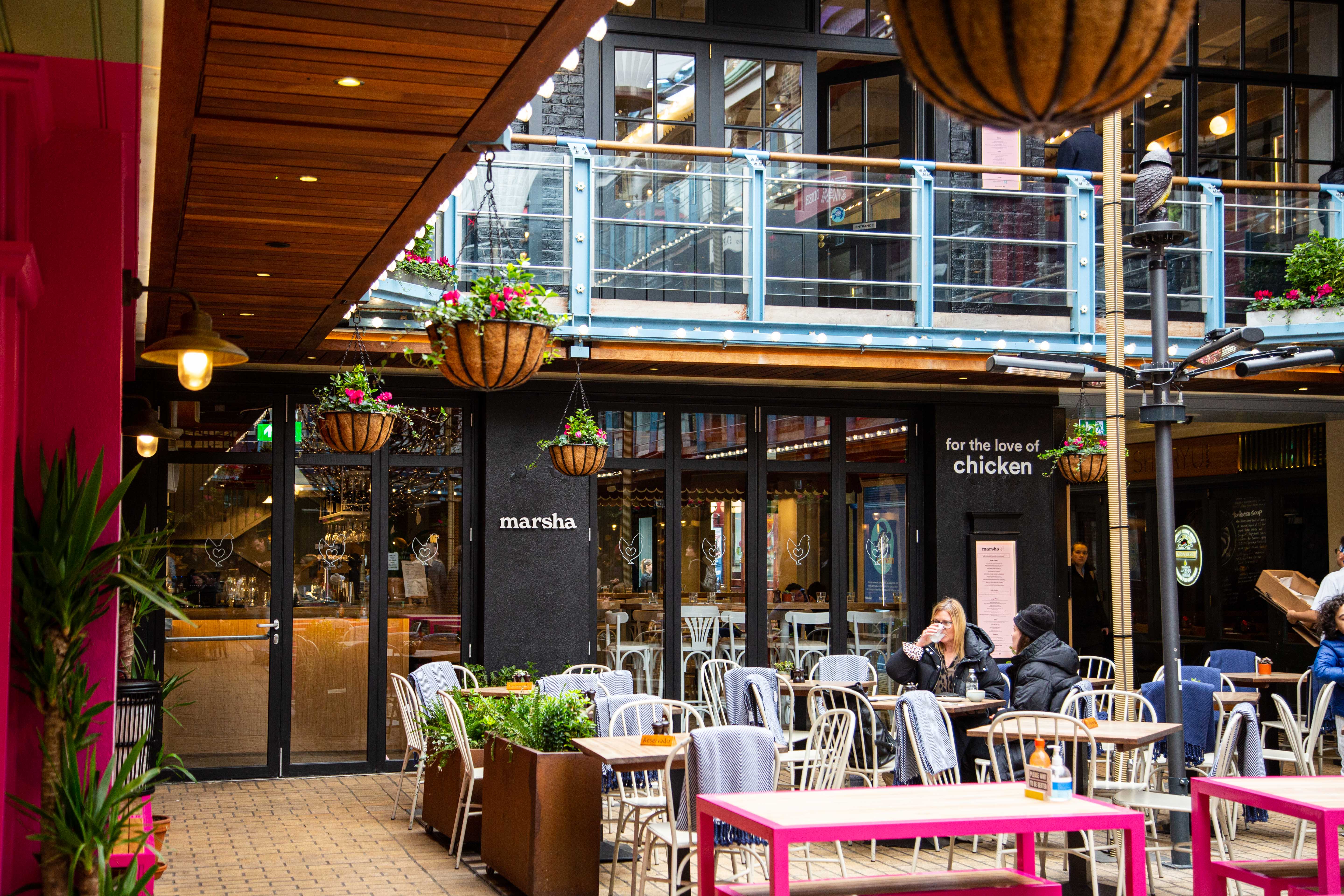 Vibrant outdoor dining space at Paradiso Soho, perfect for casual meetings and events.