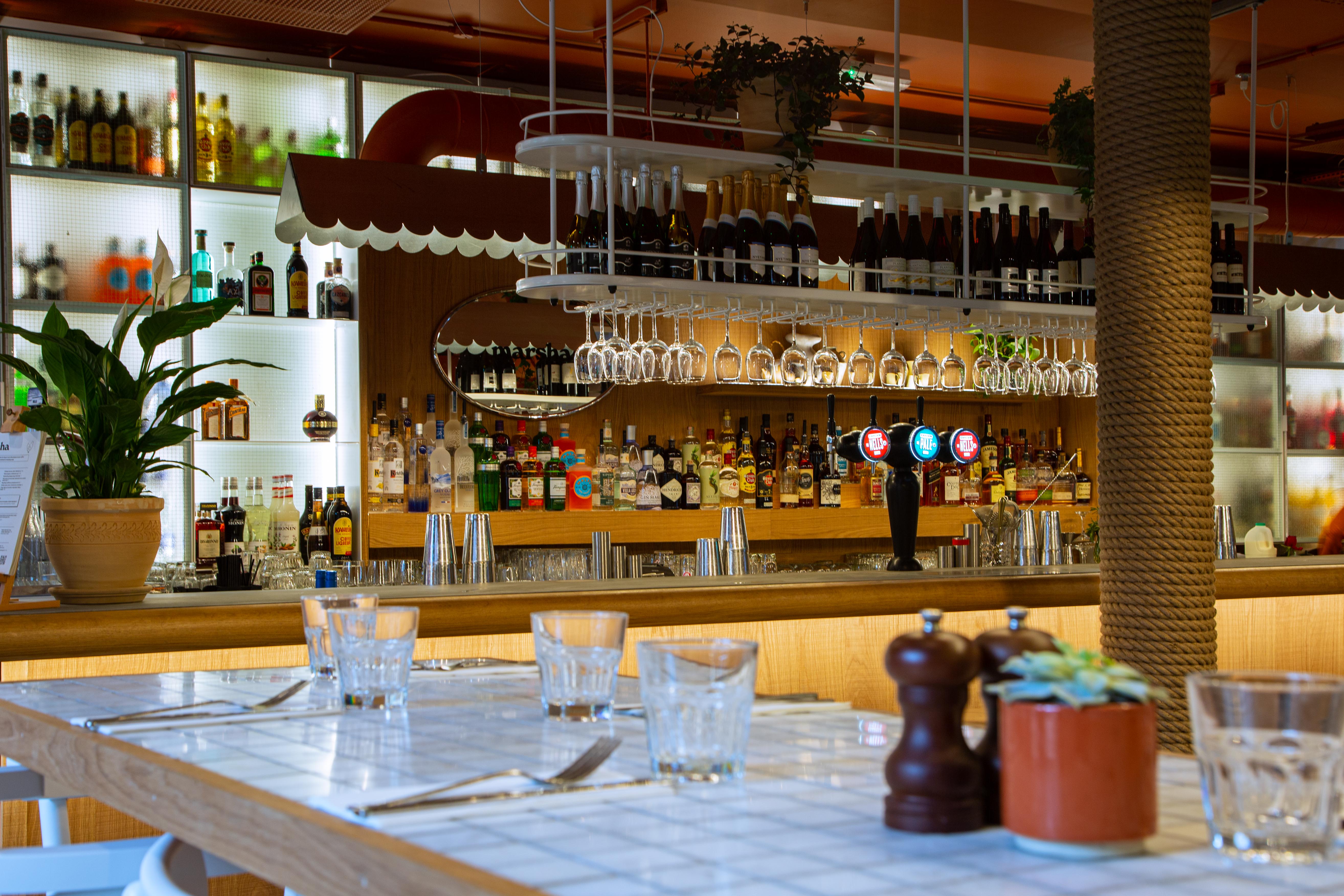 Vibrant bar at Upstairs in Paradiso Soho, perfect for networking events and casual meetings.