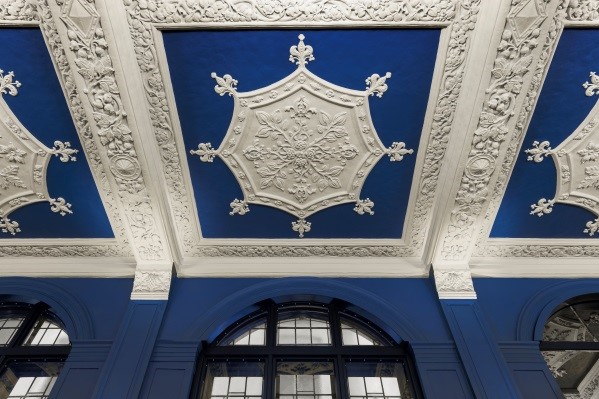 Elegant ceiling with intricate plasterwork in L'oscar London, perfect for gala events.