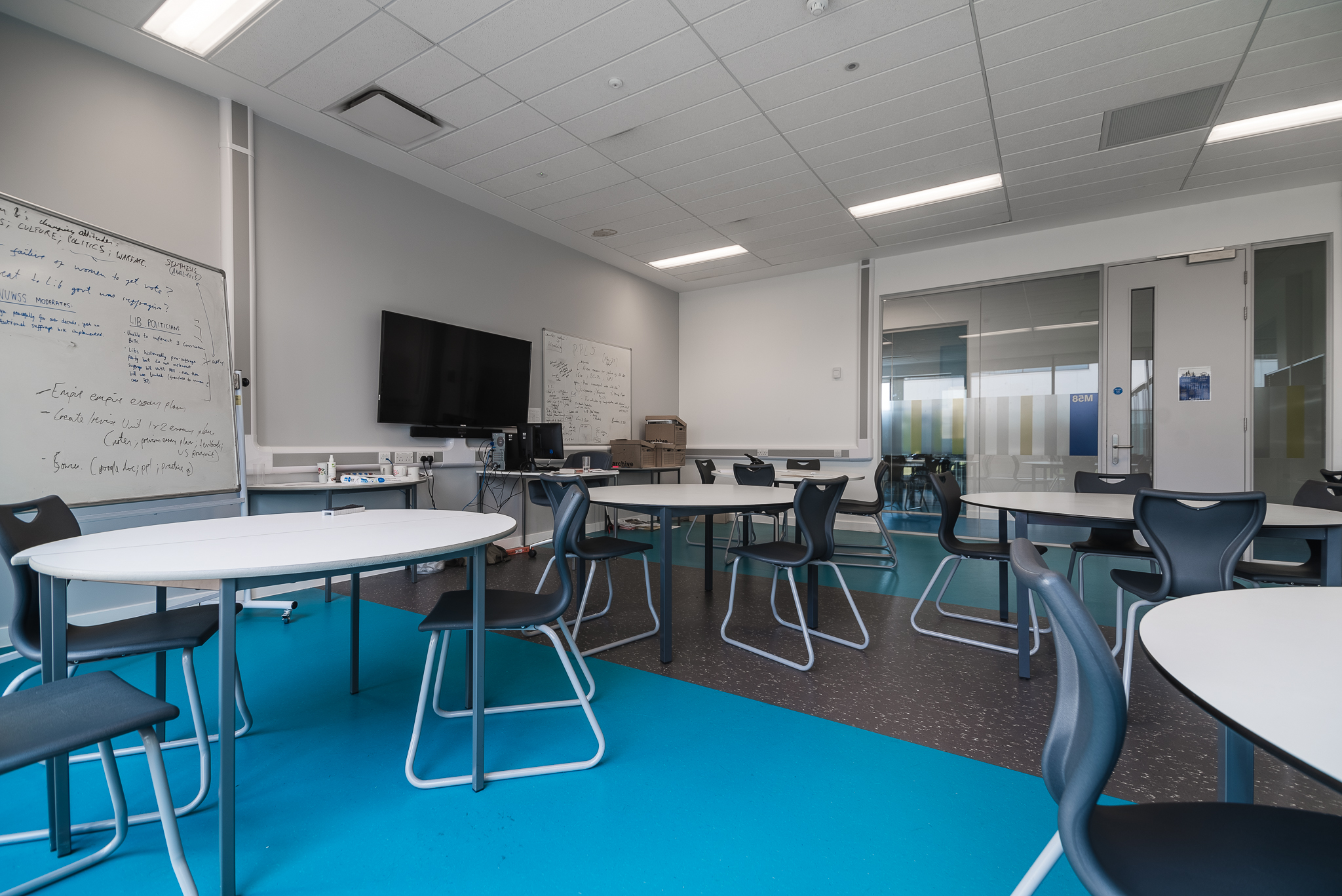 Breakout room at London Academy of Excellence with modern seating for workshops and meetings.
