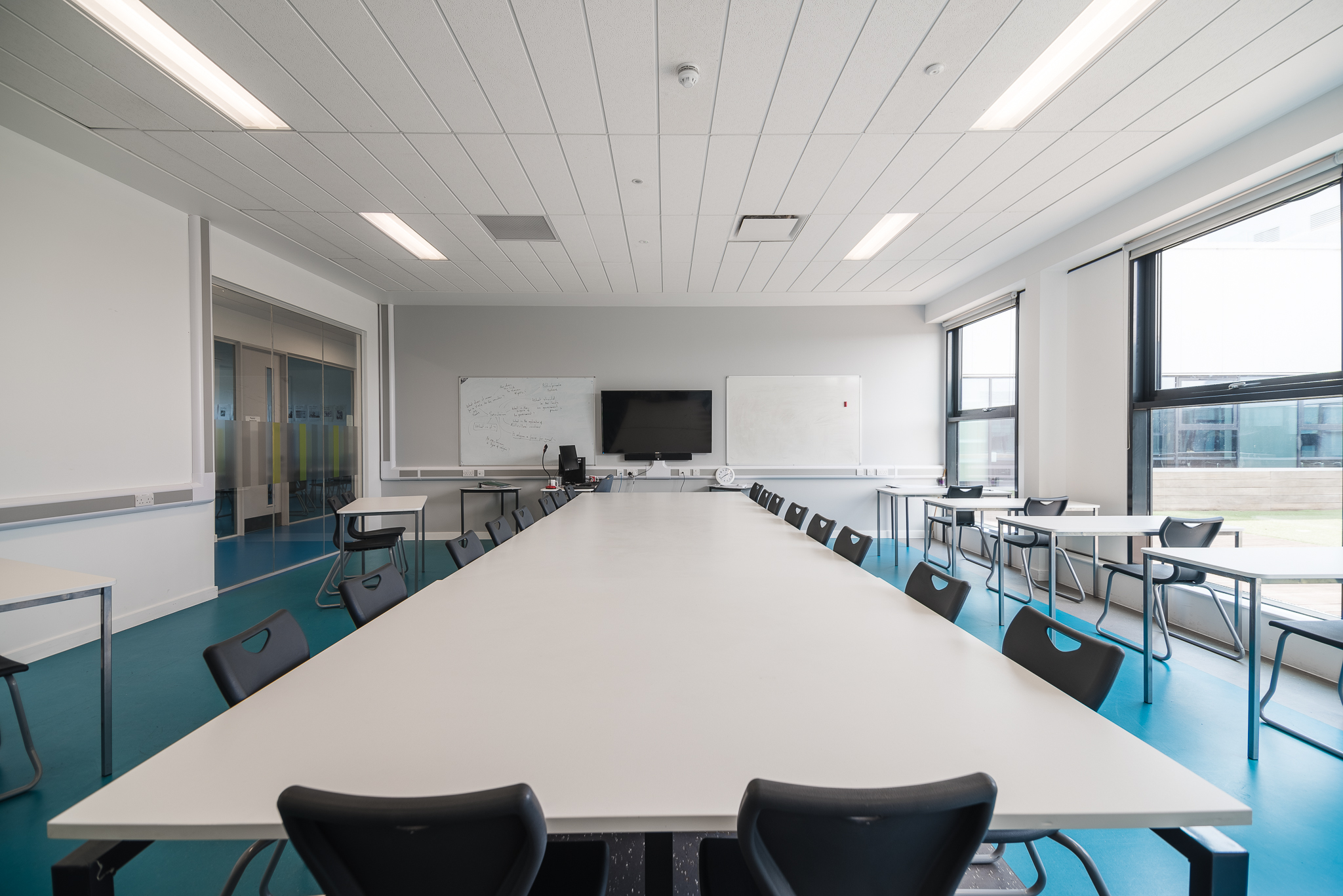 Modern breakout room in London Academy of Excellence for workshops and meetings.