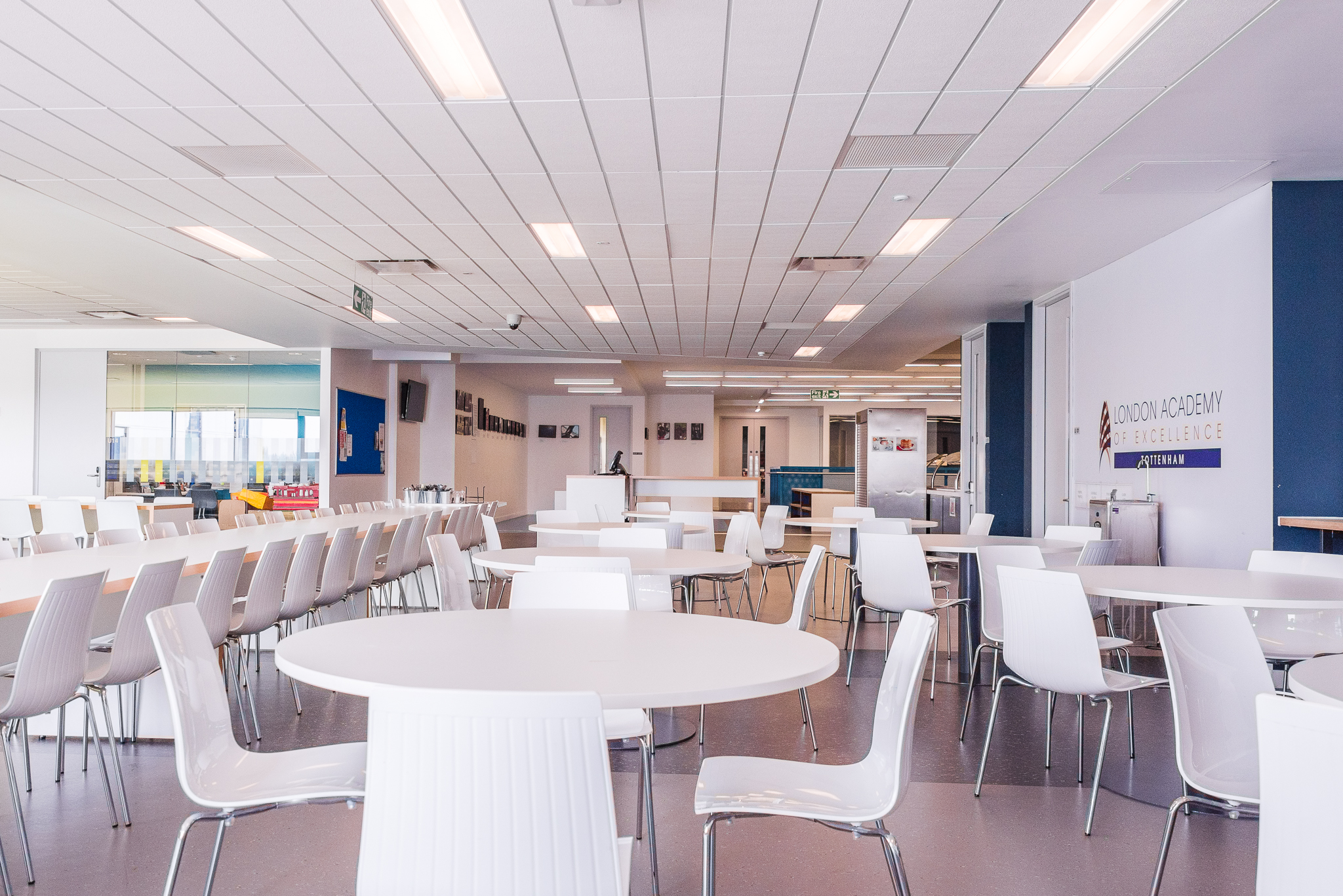 Modern dining space at London Academy of Excellence for workshops and networking events.
