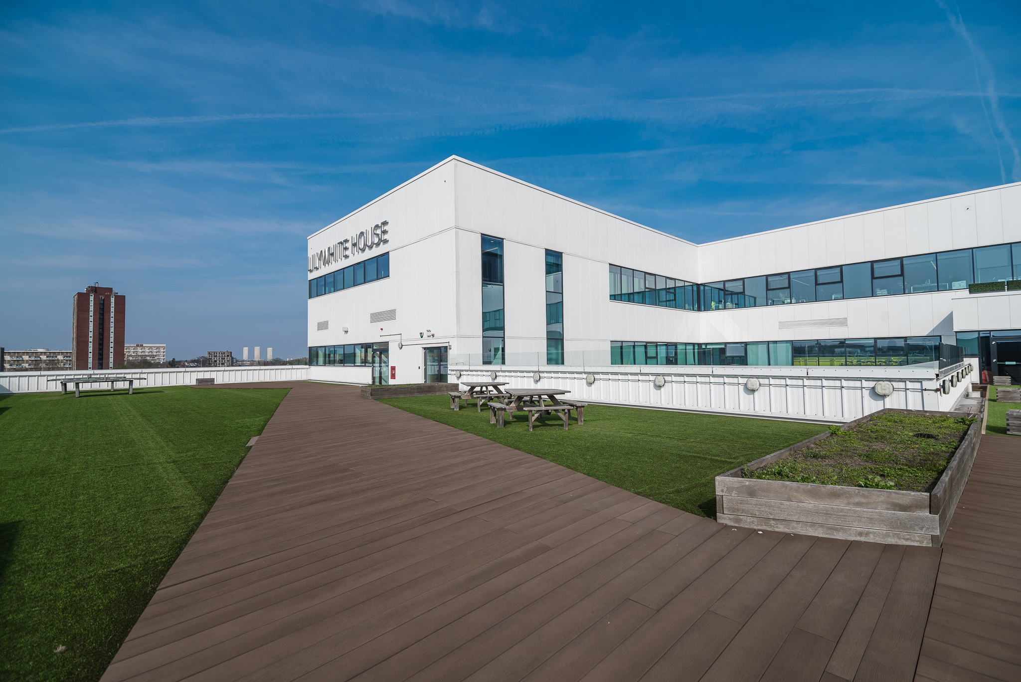Modern roof terrace at London Academy of Excellence, ideal for conferences and meetings.
