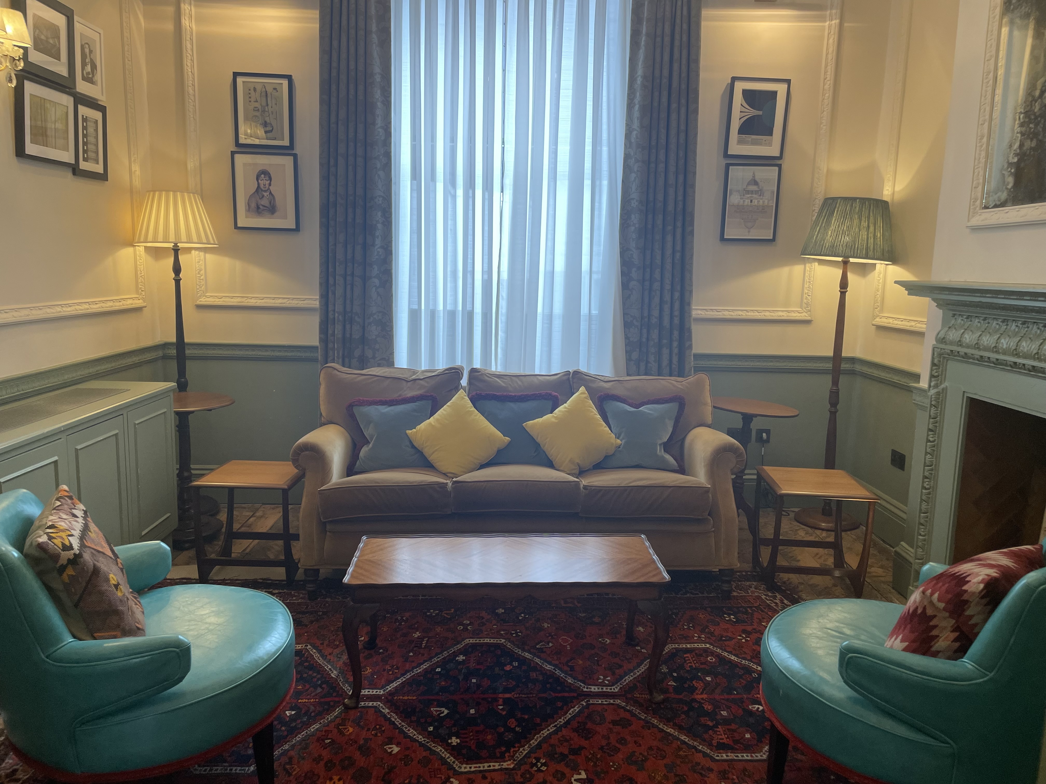 Cozy Portman Room at Home Grown Club, perfect for meetings and brainstorming sessions.