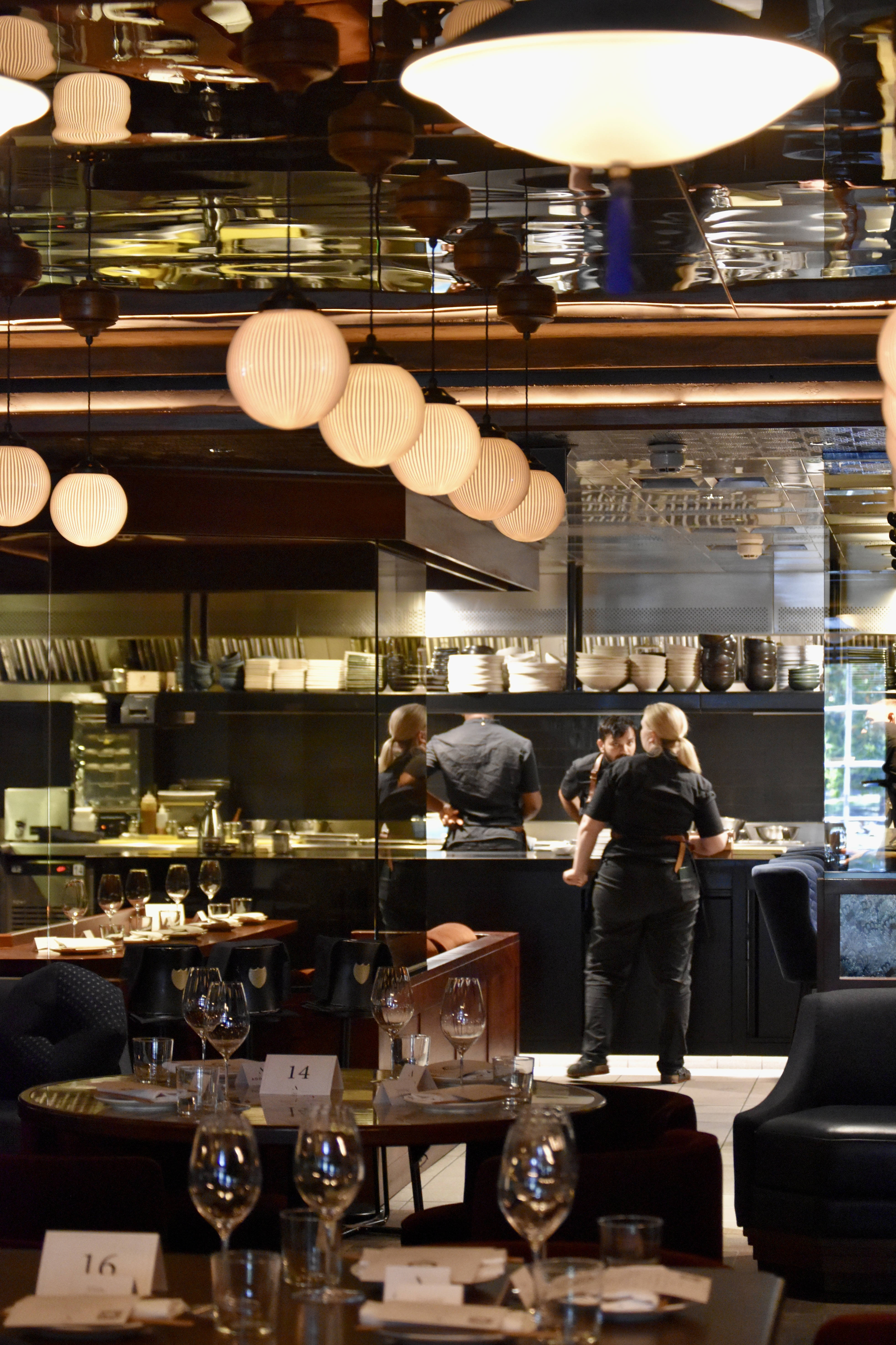 Modern restaurant kitchen at Lucky Cat by Gordon Ramsay, perfect for intimate events.