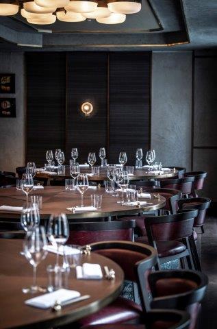 Elegant dining setup in Sora room, perfect for corporate dinners and networking events.