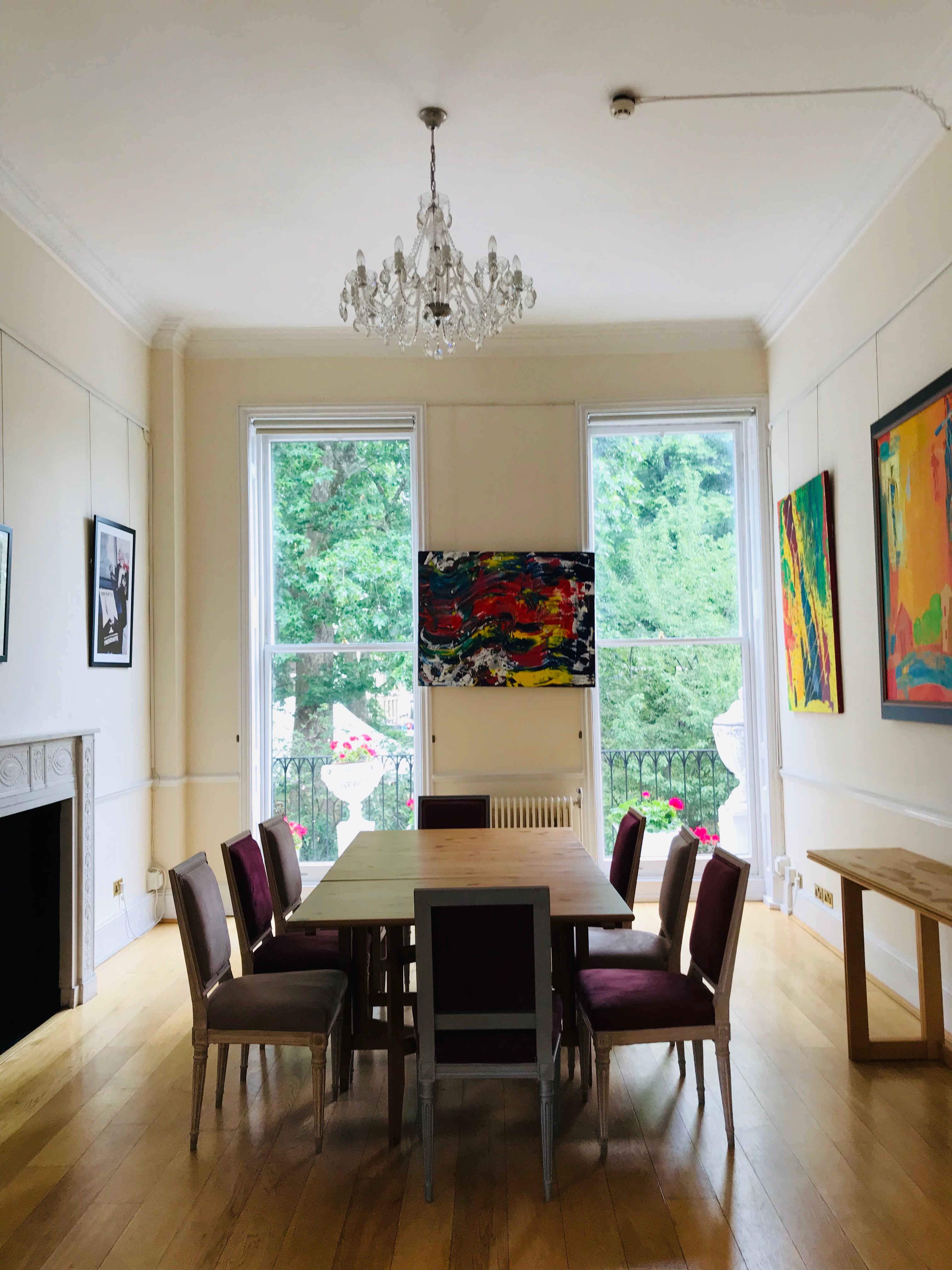 Bright Grand Hall with large windows, perfect for workshops and meetings.