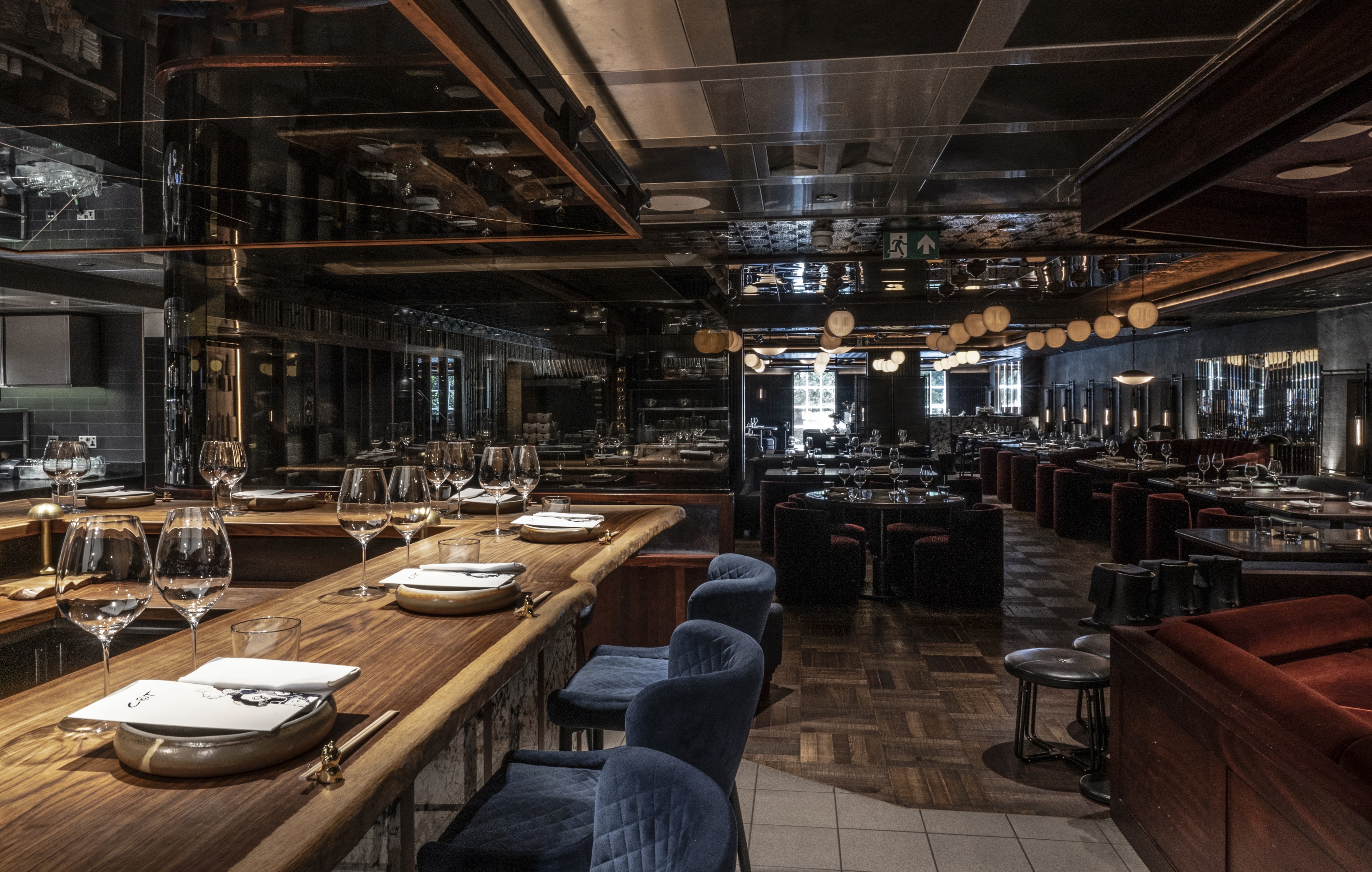 Elegant kitchen table in Gordon Ramsay's Lucky Cat, perfect for upscale events and meetings.