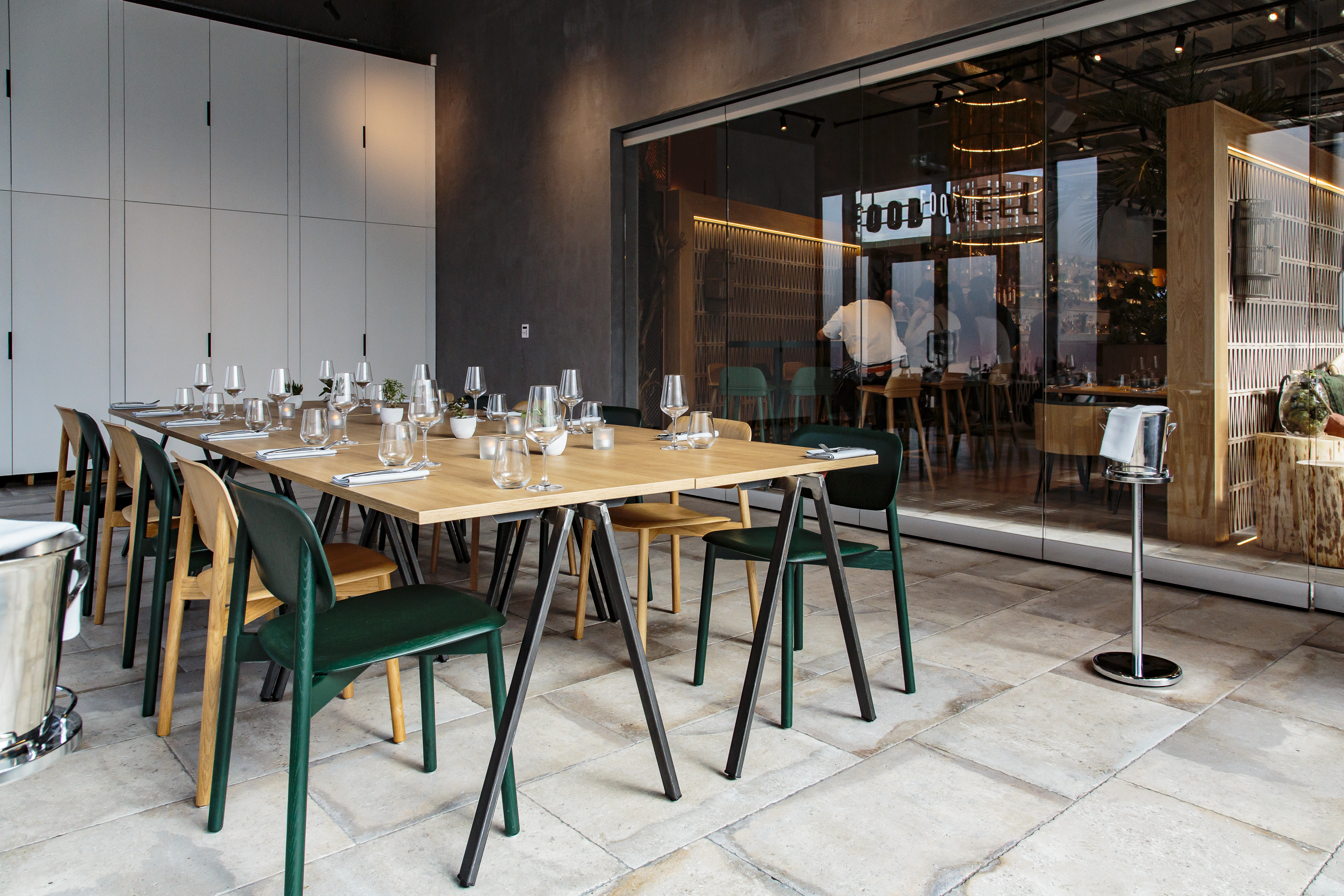 Modern dining setup in FoodWell studio, ideal for intimate meetings and events.