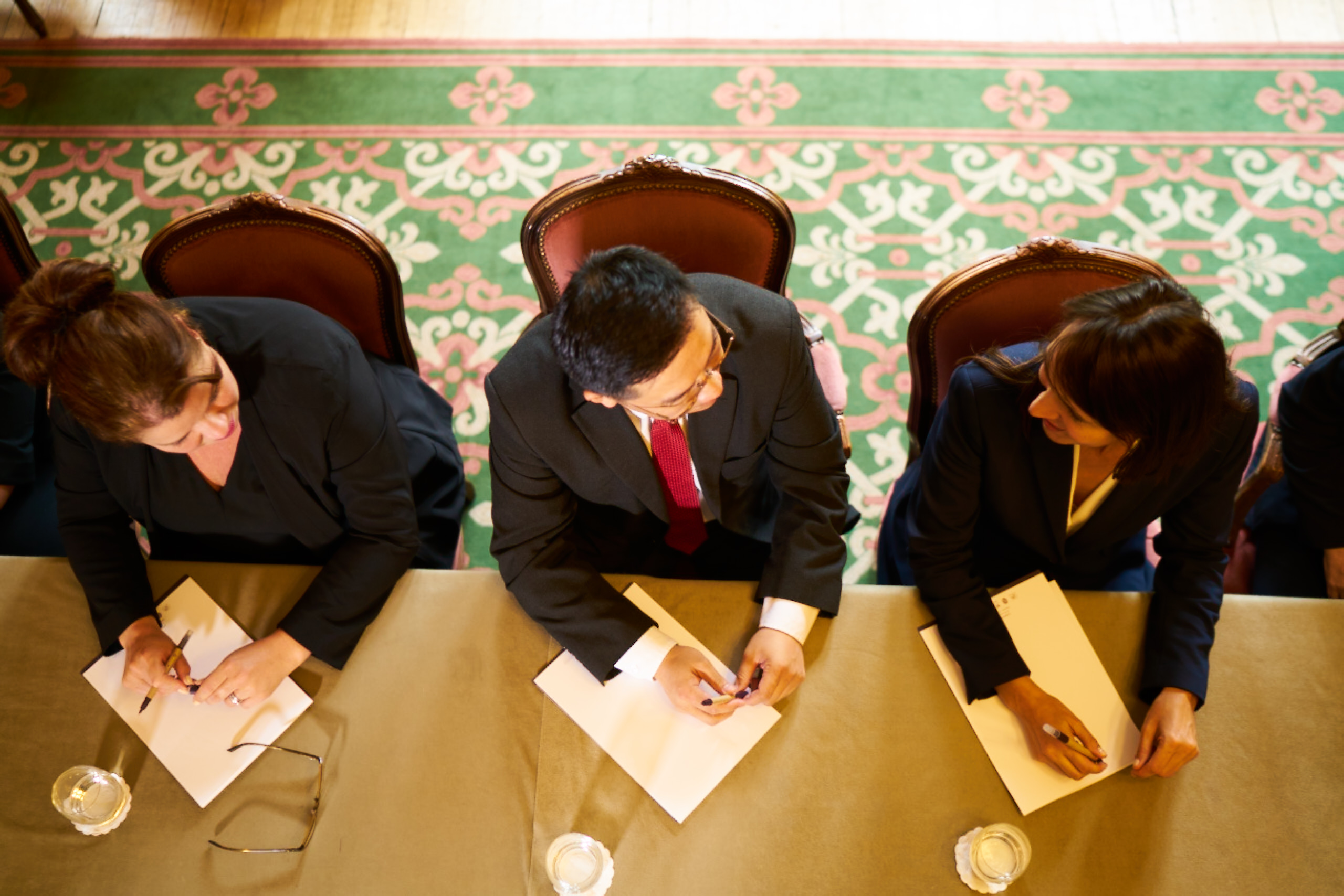 Jacob Henniker at a formal meeting in Ashdown Park Hotel, ideal for strategic planning.