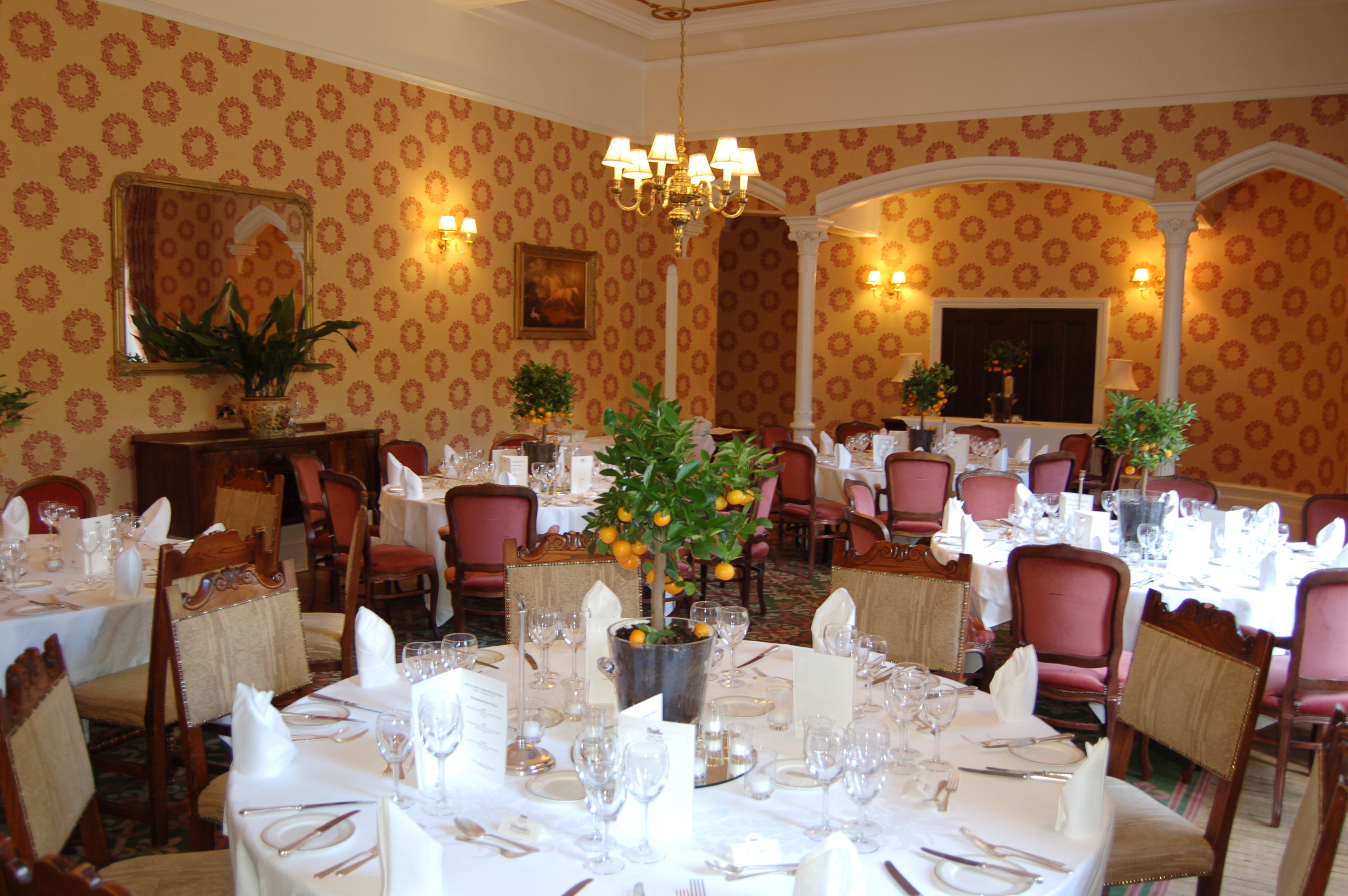 Elegant dining room at Ashdown Park Hotel, perfect for formal events and gatherings.