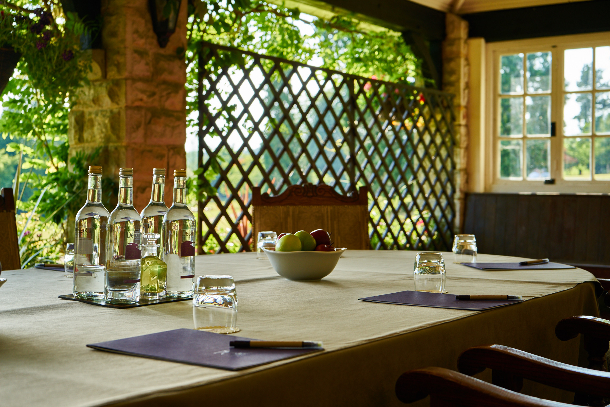 Meeting space at Ashdown Park Hotel with natural light, ideal for workshops and events.