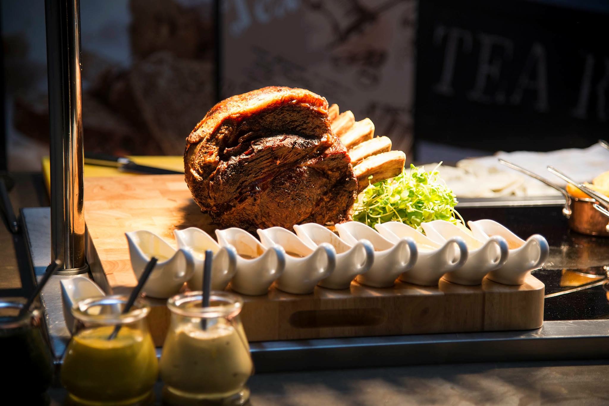 "Carving station at Marco Pierre White Steakhouse, elegant roast for events in London."