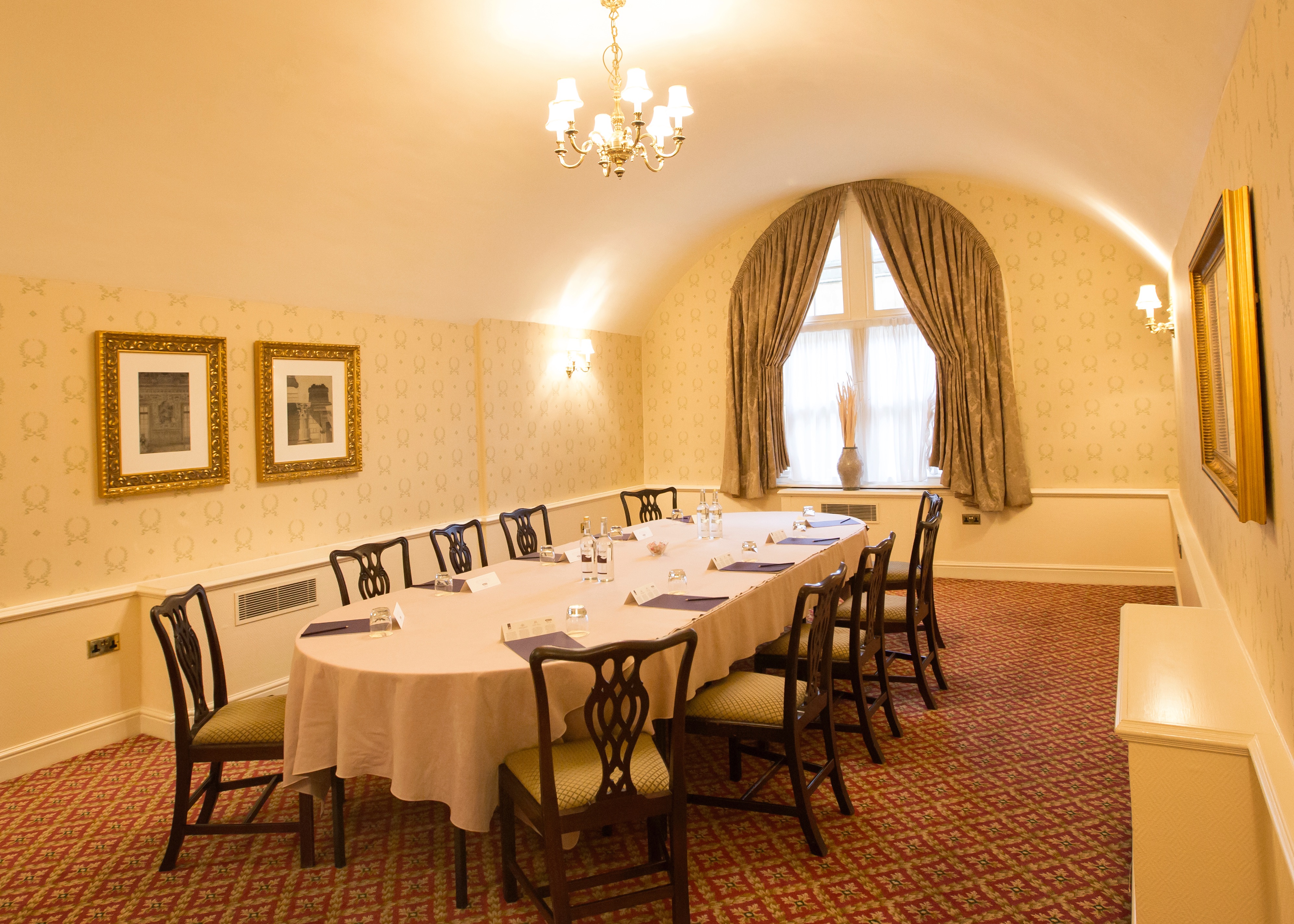 Arthur Davis in elegant meeting room at Luton Hoo Hotel, ideal for conferences and gatherings.