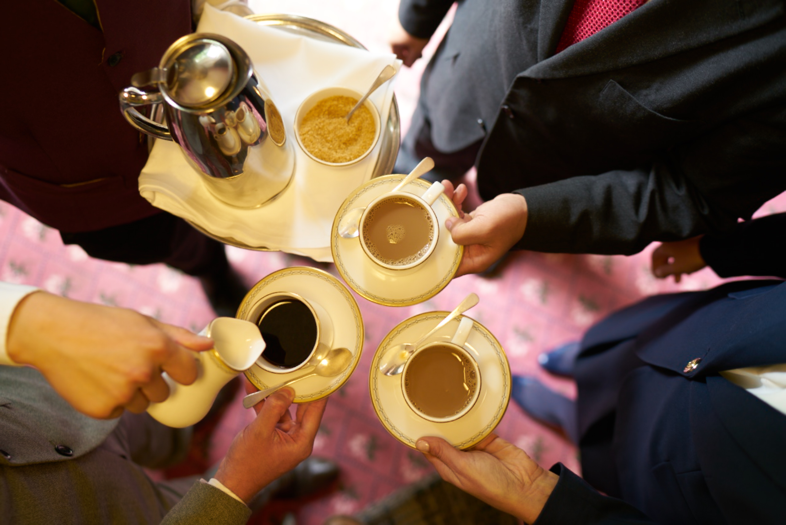 Coffee service at networking event in Luton Hoo Hotel, showcasing hospitality and attention to detail.