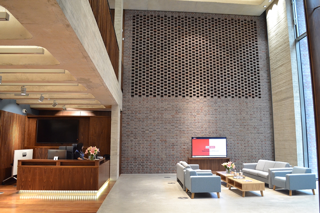 Modern lobby of Elizabeth Room, ideal for meetings and events with natural light.