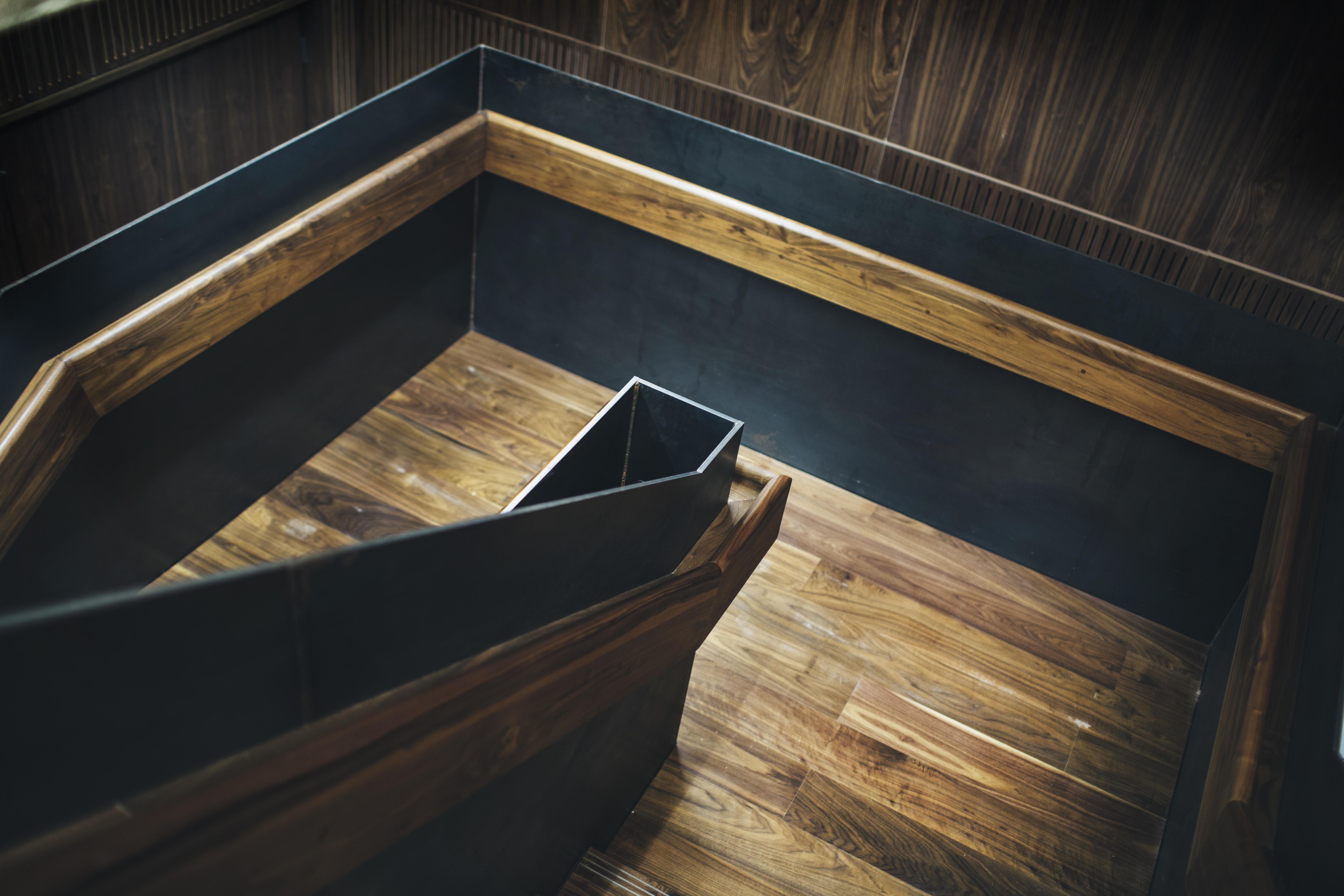 Stylish staircase with wooden accents at Elizabeth Room, perfect for events and networking.