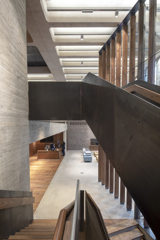 Modern event venue with sleek design, ideal for meetings and networking.