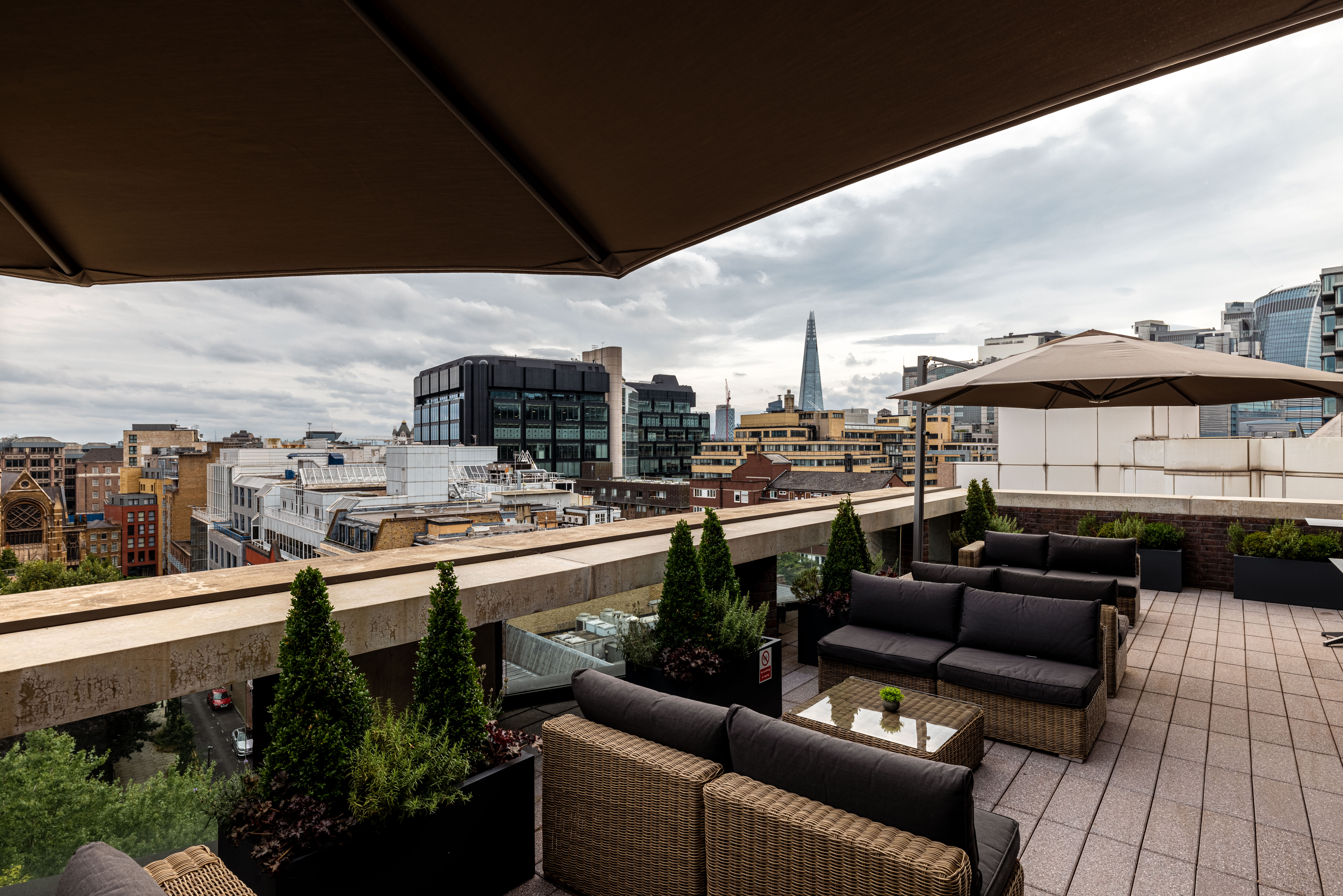 Stylish rooftop venue with city skyline, perfect for networking events and cocktail receptions.