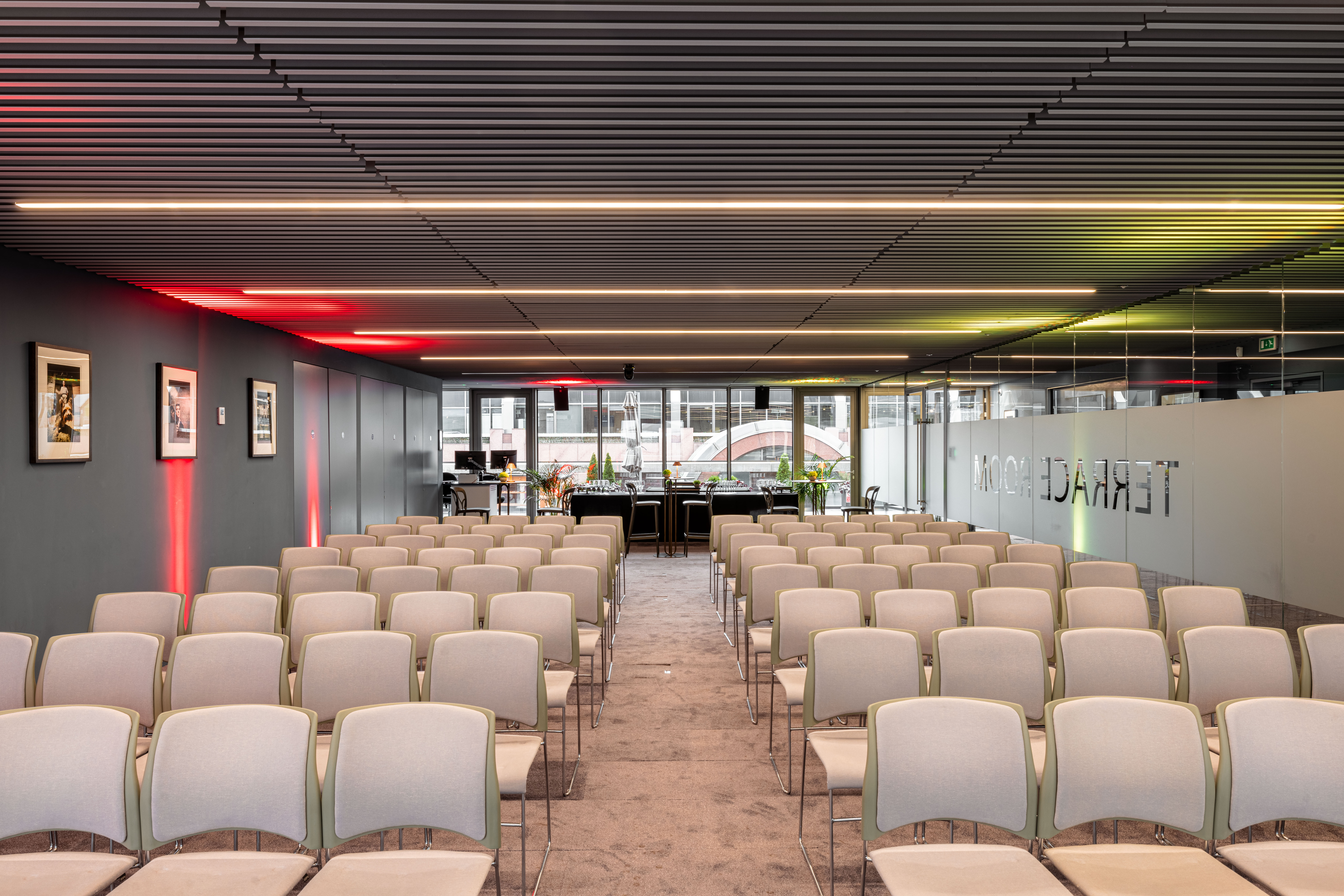 Modern event space with sleek design, ideal for corporate meetings and workshops.