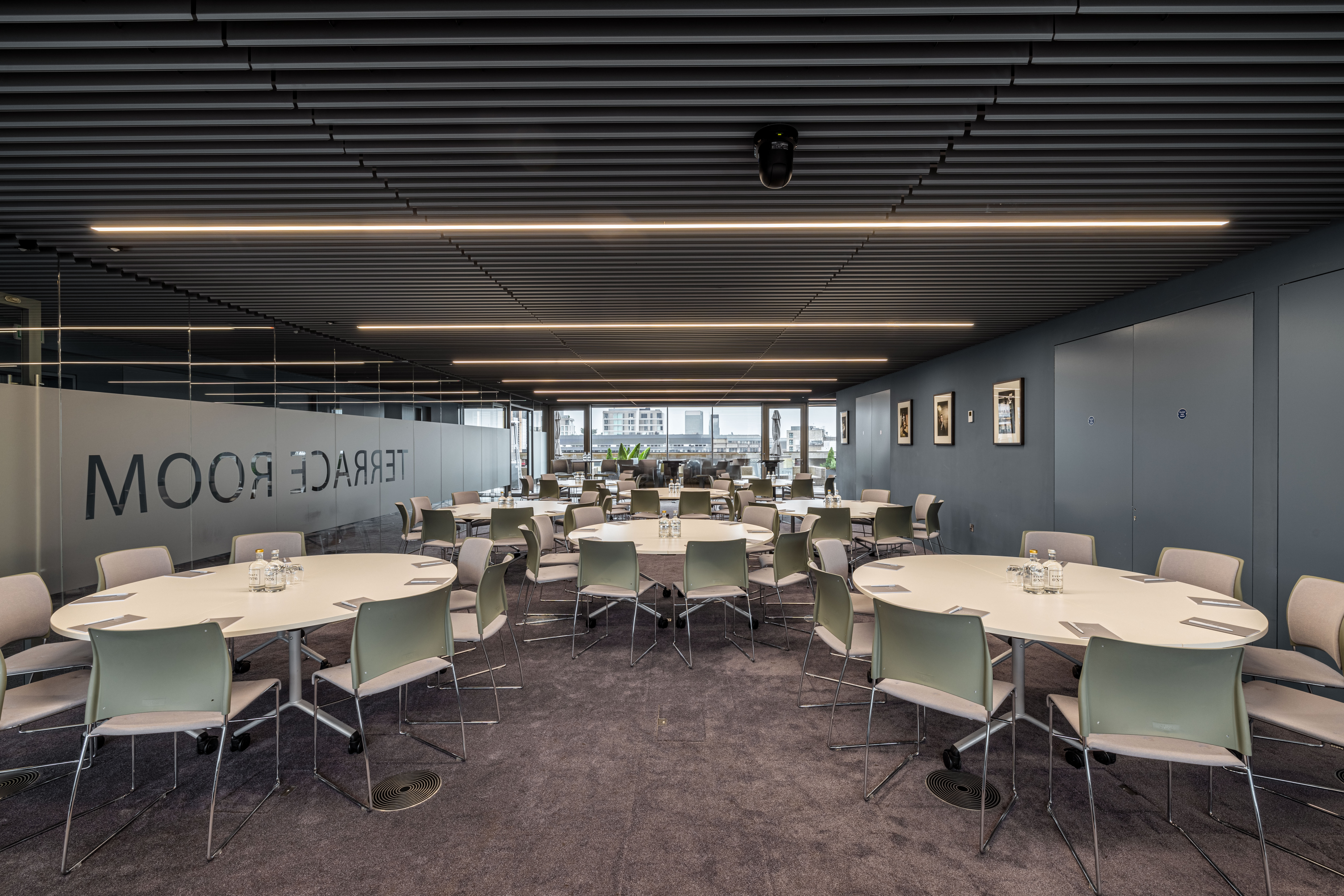 Modern event space with round tables, ideal for meetings and workshops at Events @ No 6.